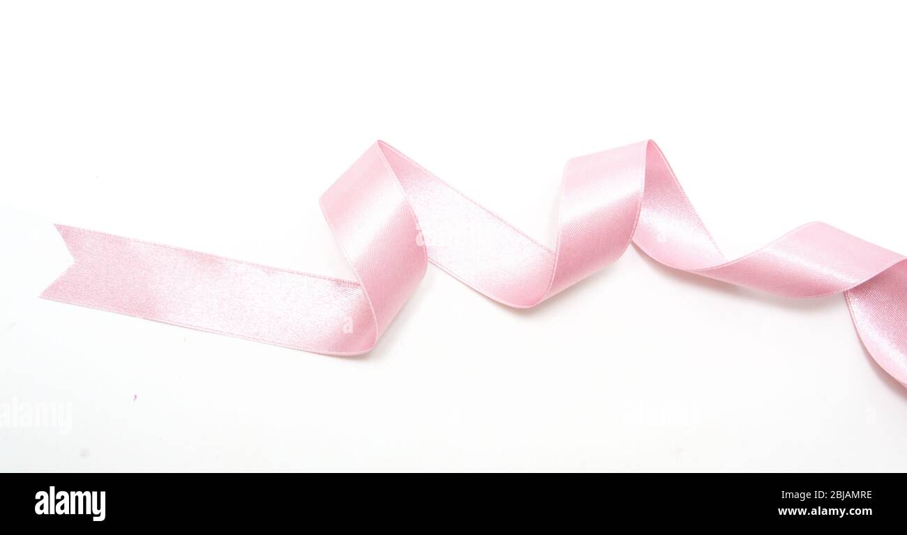 Pink ribbon bow in isolated on white background Stock Photo - Alamy