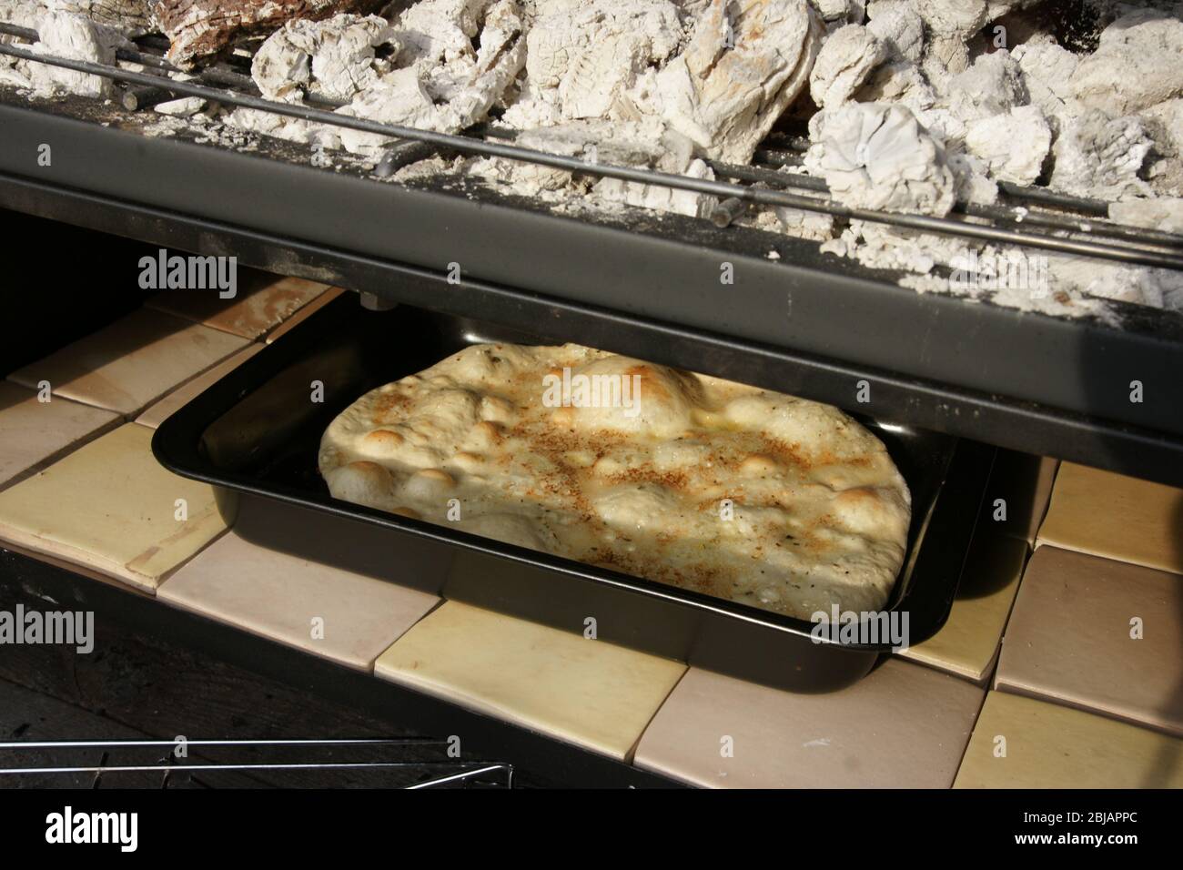 cooked on the barbecue, rustic garlic bread Stock Photo Alamy