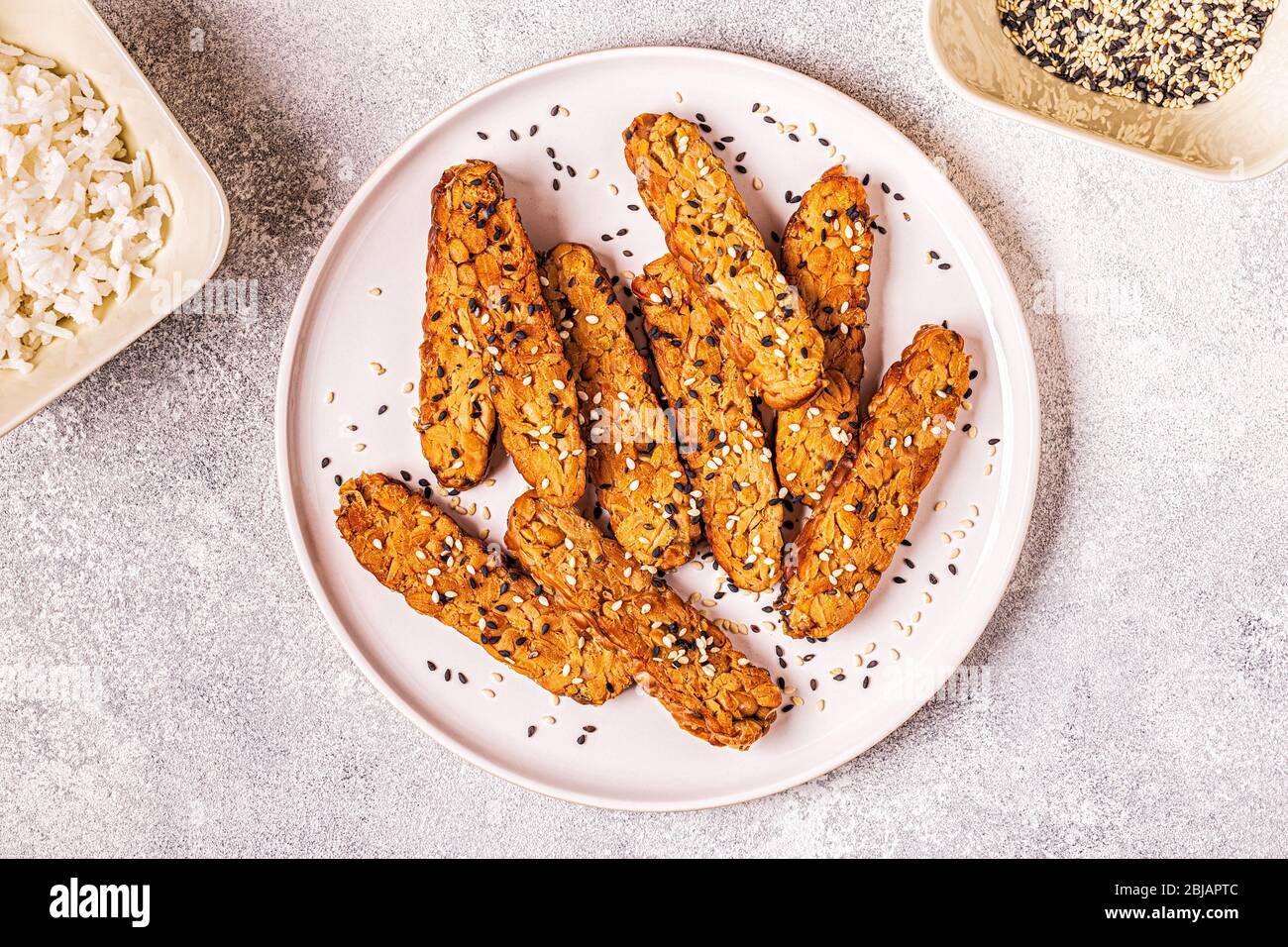 Fried tempeh with sesame seeds, traditional indonesian cuisine Stock