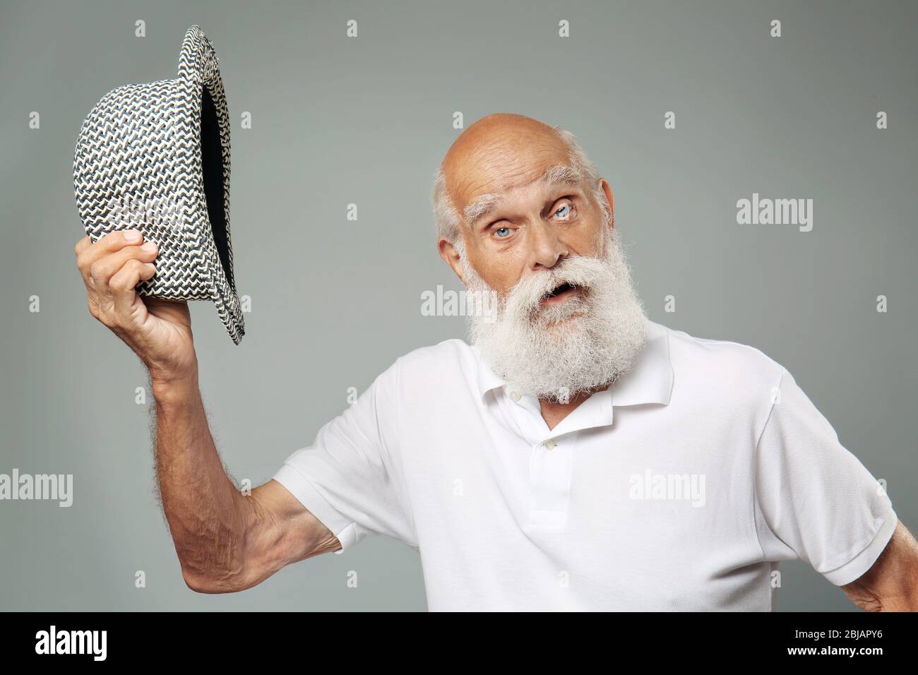 Older man white shirt hat hi-res stock photography and images - Alamy