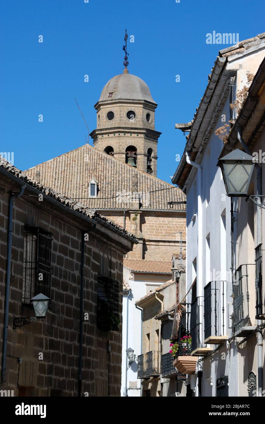 View of the Cathedral bell tower seen at the end of an old town street, Baeza, Jaen Province, Andalucia, Spain, Western Europe Stock Photo