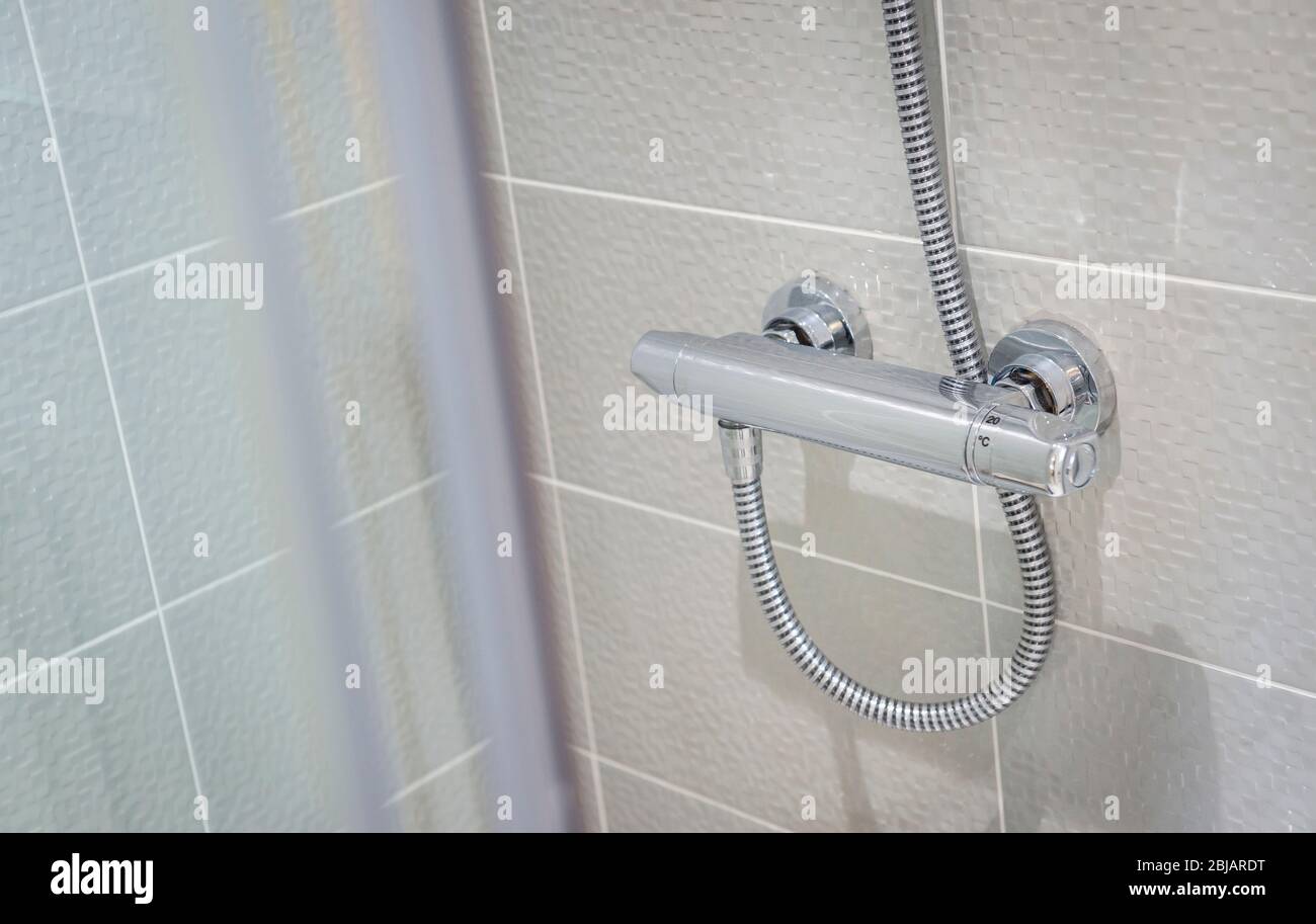 Shower control in a contemporary bathroom Stock Photo Alamy