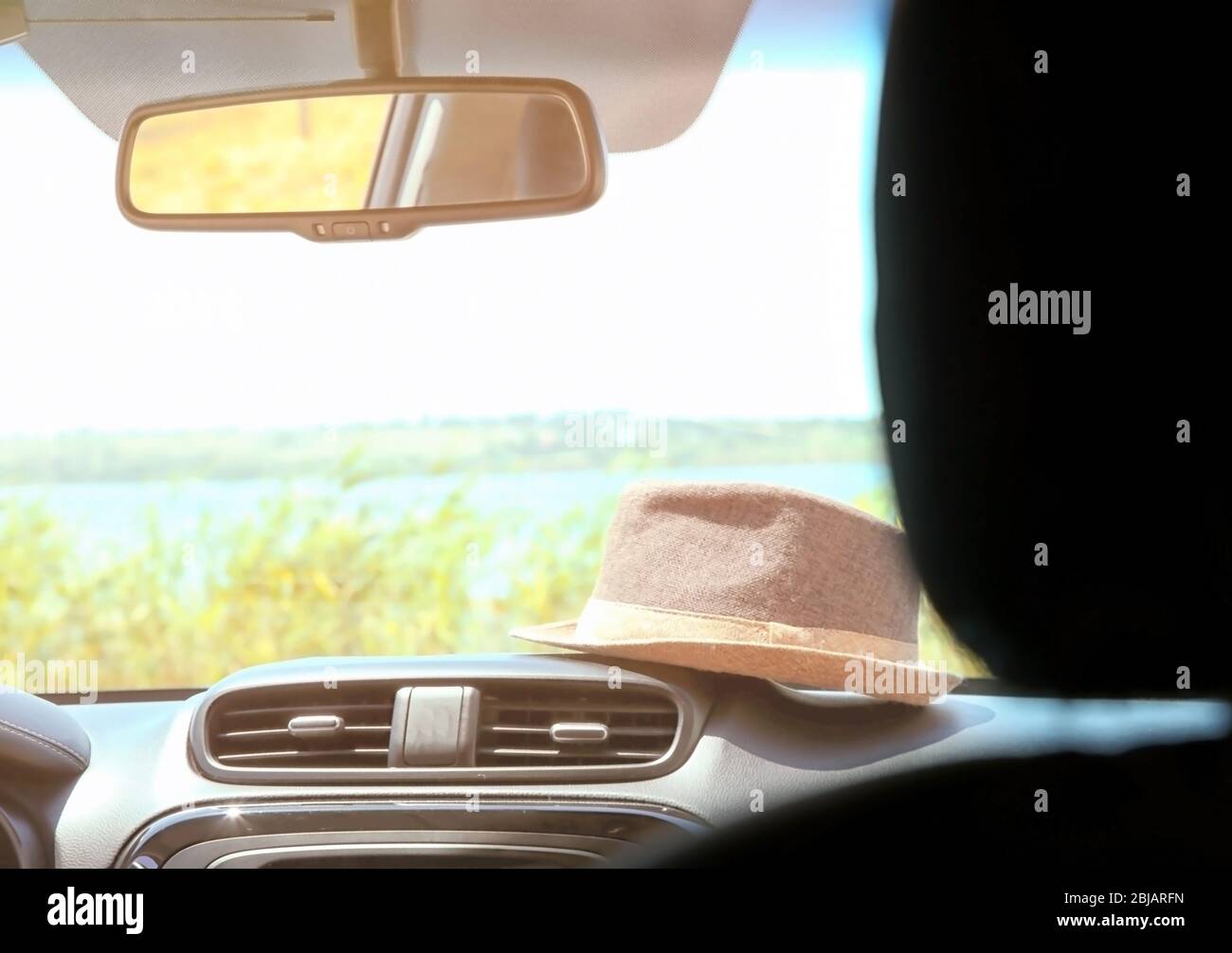 Hat on dashboard Stock Photo Alamy