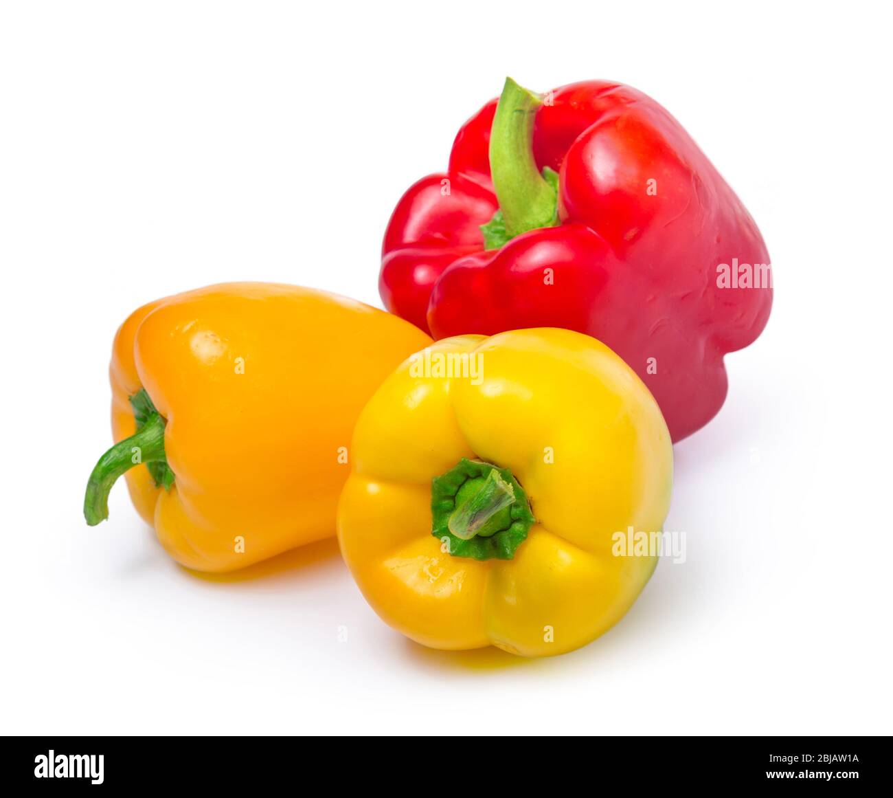 red and yellow peppers isolated on white background Stock Photo - Alamy