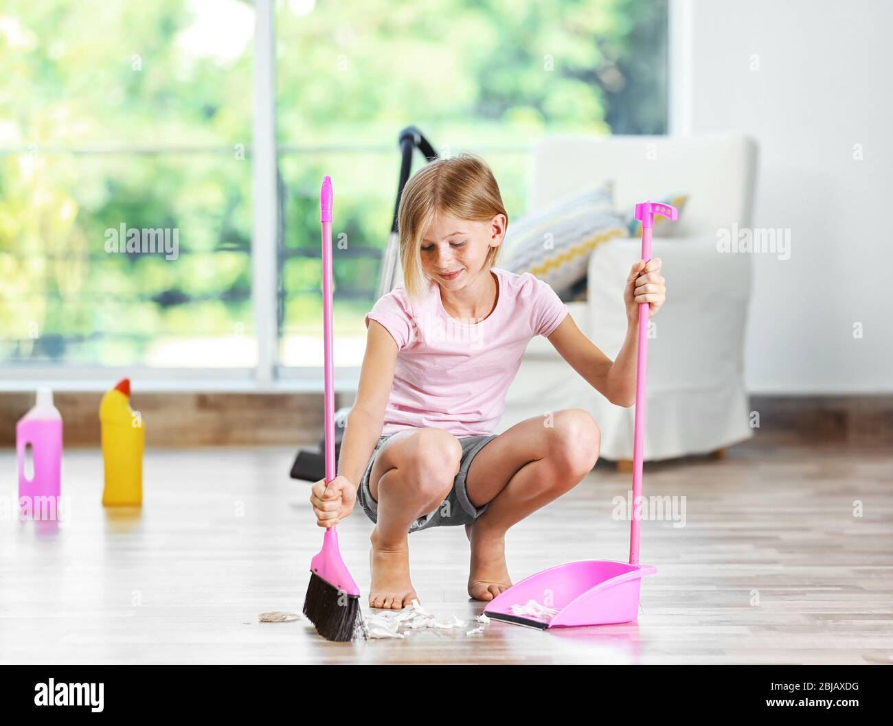 Girl sweeping hires stock photography and images Alamy