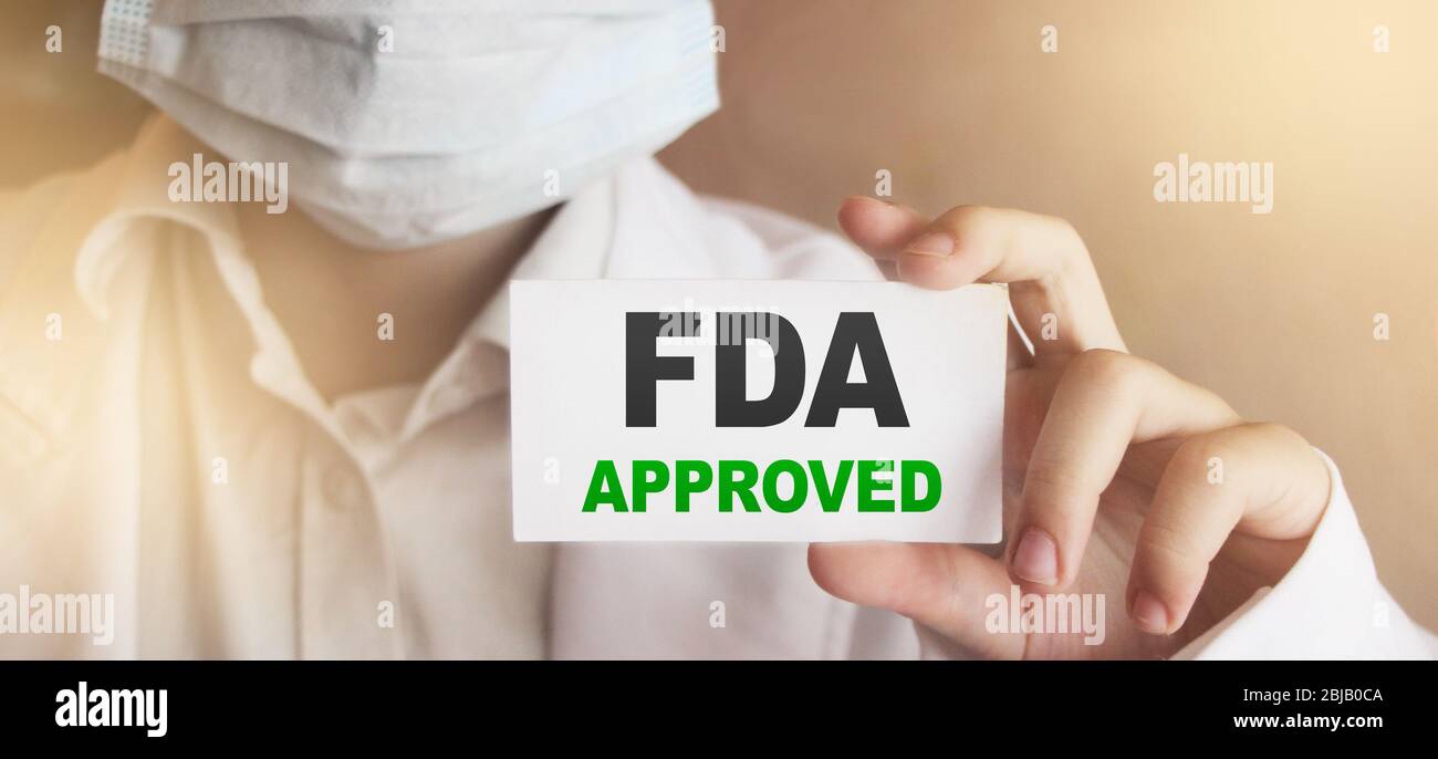 FDA Approved words on card Doctor shows. Food and Drugs Association ...