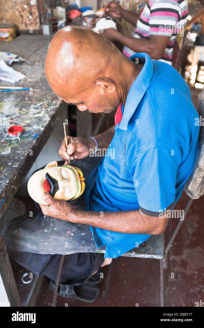 dh Ariyapala Mask Museum AMBALANGODA SRI LANKA Sri Lankan worker painting traditional masks in south east asian workshop Stock Photo
