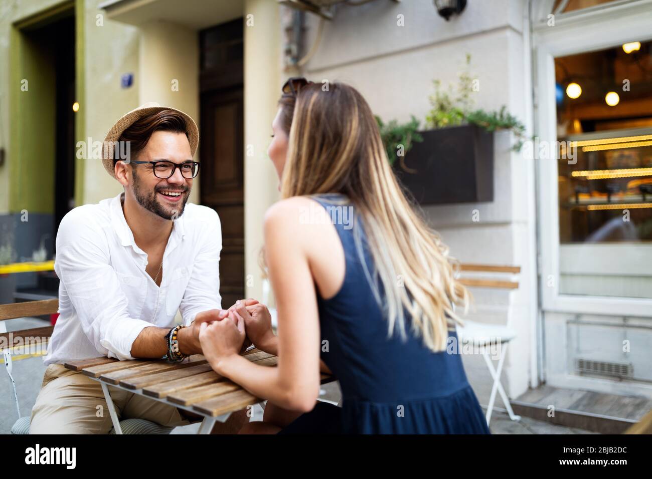 Beautiful couple in love dating outdoors and smiling Stock Photo