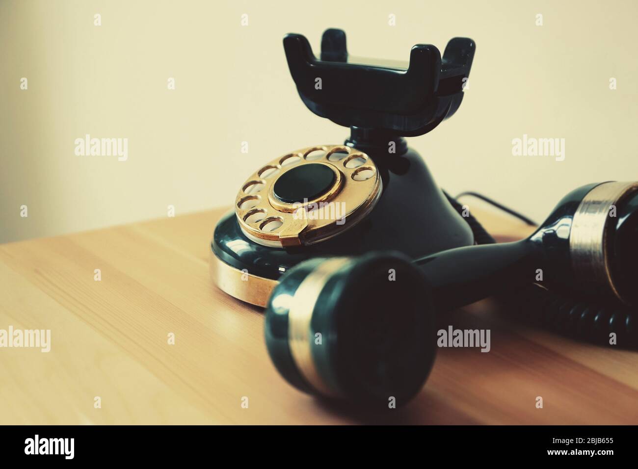 Old telephone on table, closeup Stock Photo Alamy