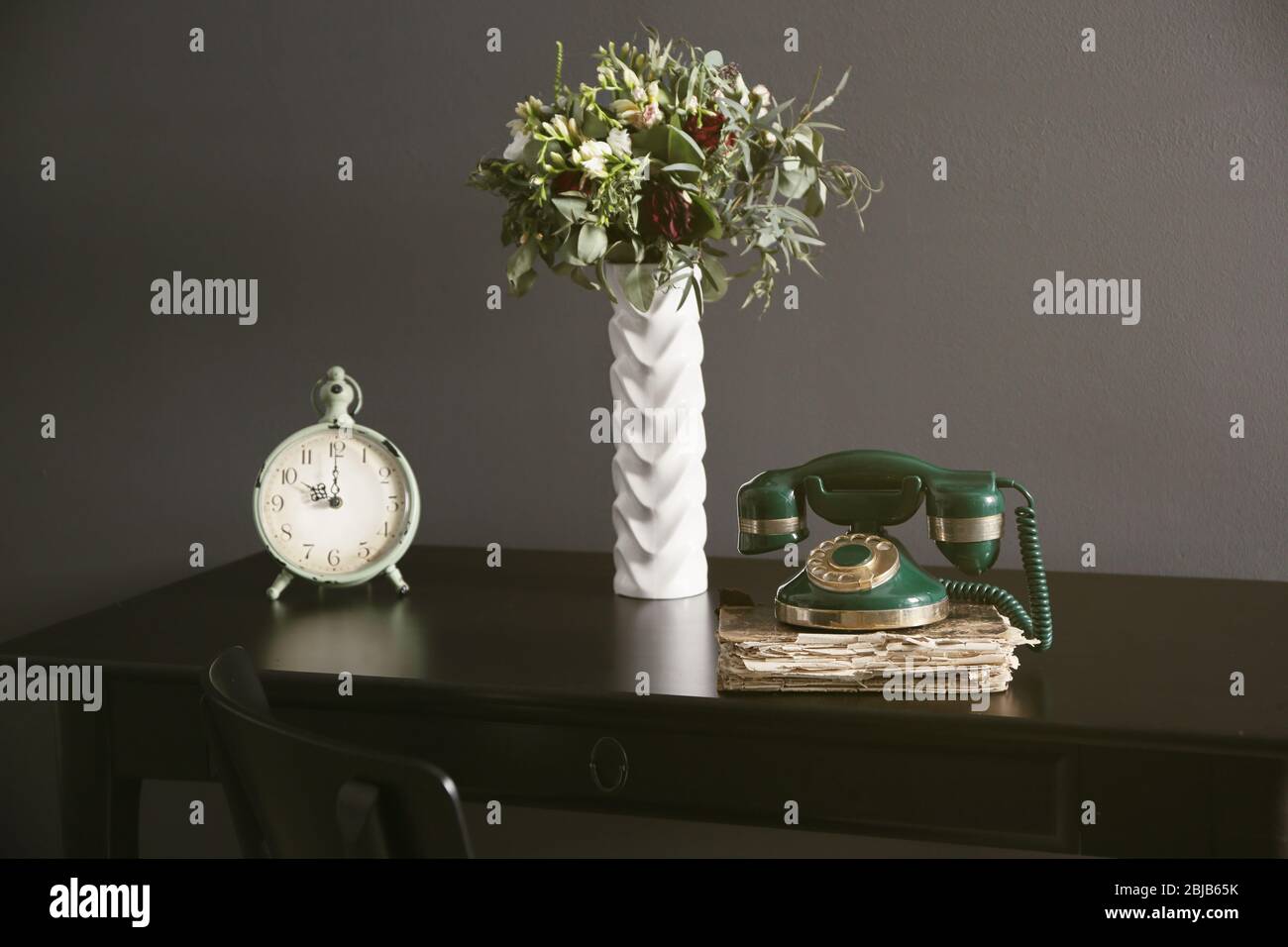 Old telephone on the table in room Stock Photo Alamy