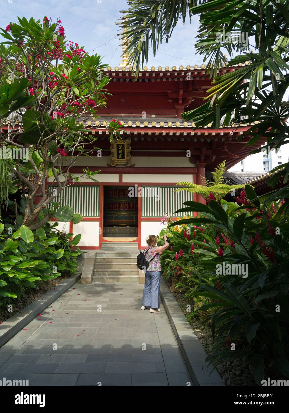 dh Buddha Tooth Relic Temple CHINATOWN SINGAPORE Woman tourist Buddhist