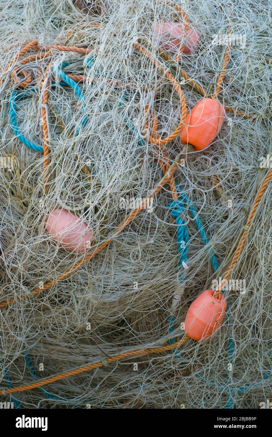 Fishing nets and coloured rope, Sheringham, Norfolk, England. Stock Photo
