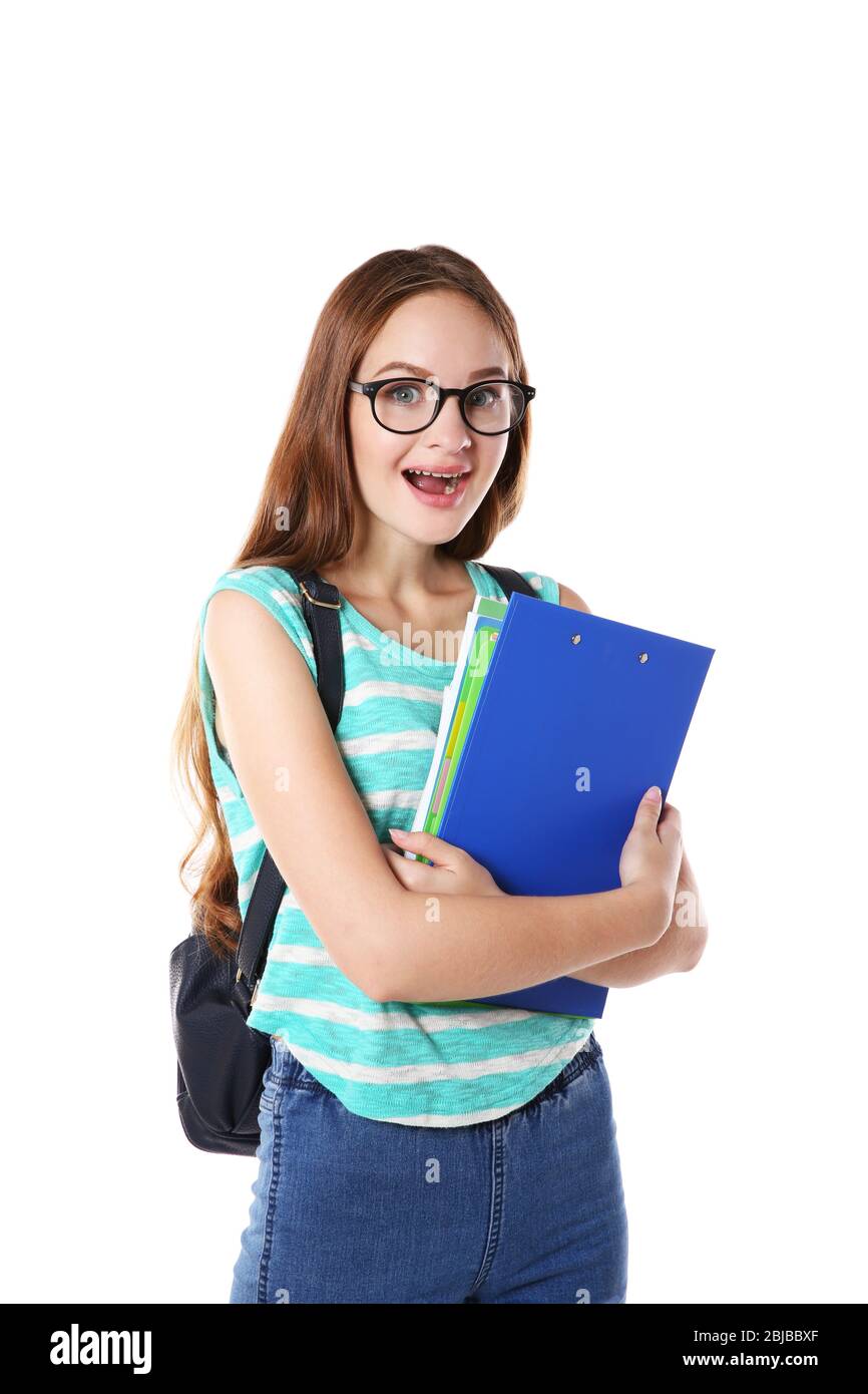 Cute teenage girl holding papers on white background Stock Photo - Alamy
