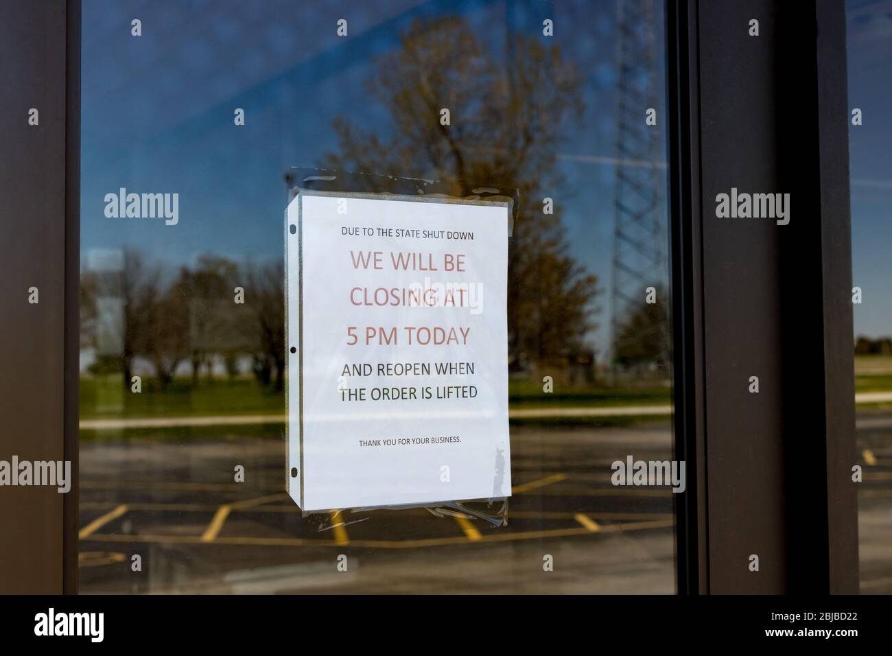 Business closed sign due to stay at home order in Illinois during Covid-19 coronavirus pandemic Stock Photo