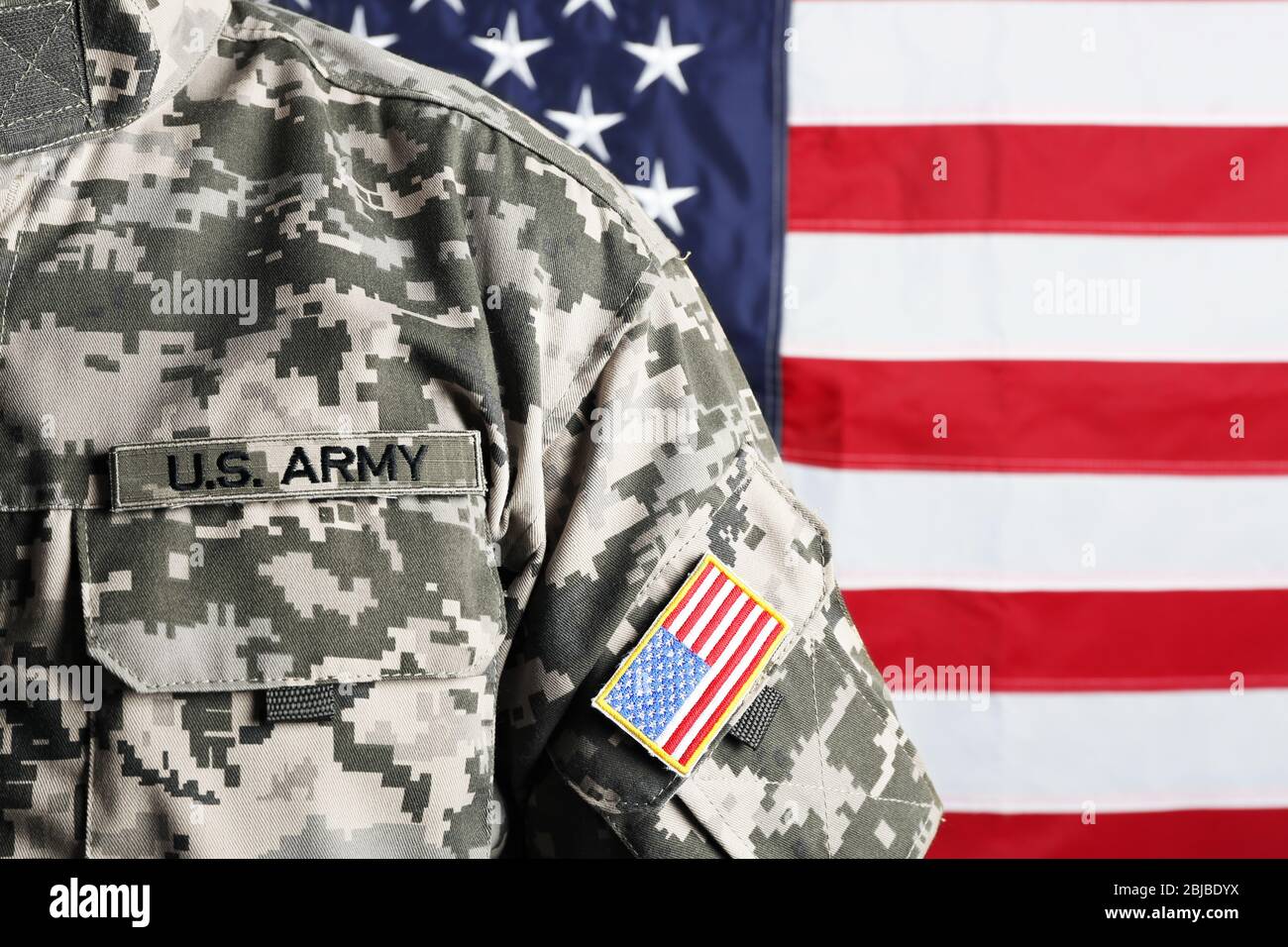 Male army soldier on American flag background Stock Photo - Alamy