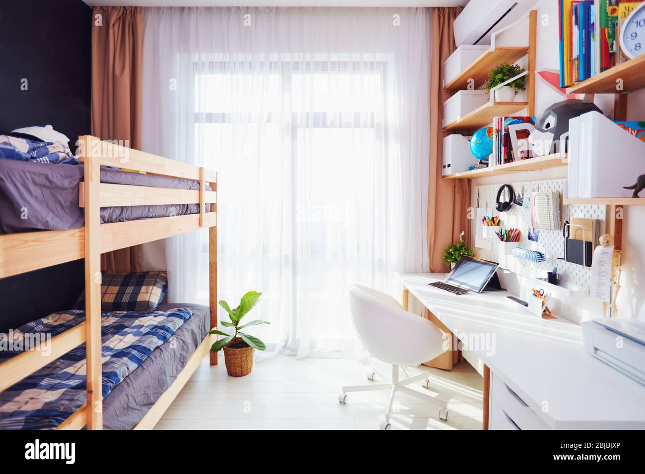 modern bright kids room with bunk bed and wall shelves Stock Photo Alamy