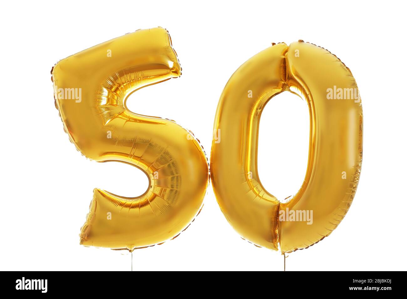 Golden birthday balloons on light background Stock Photo Alamy