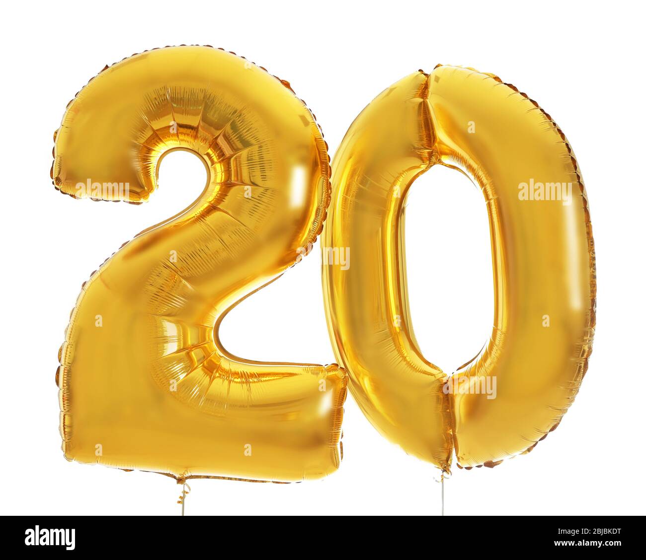 Golden birthday balloons on light background Stock Photo Alamy