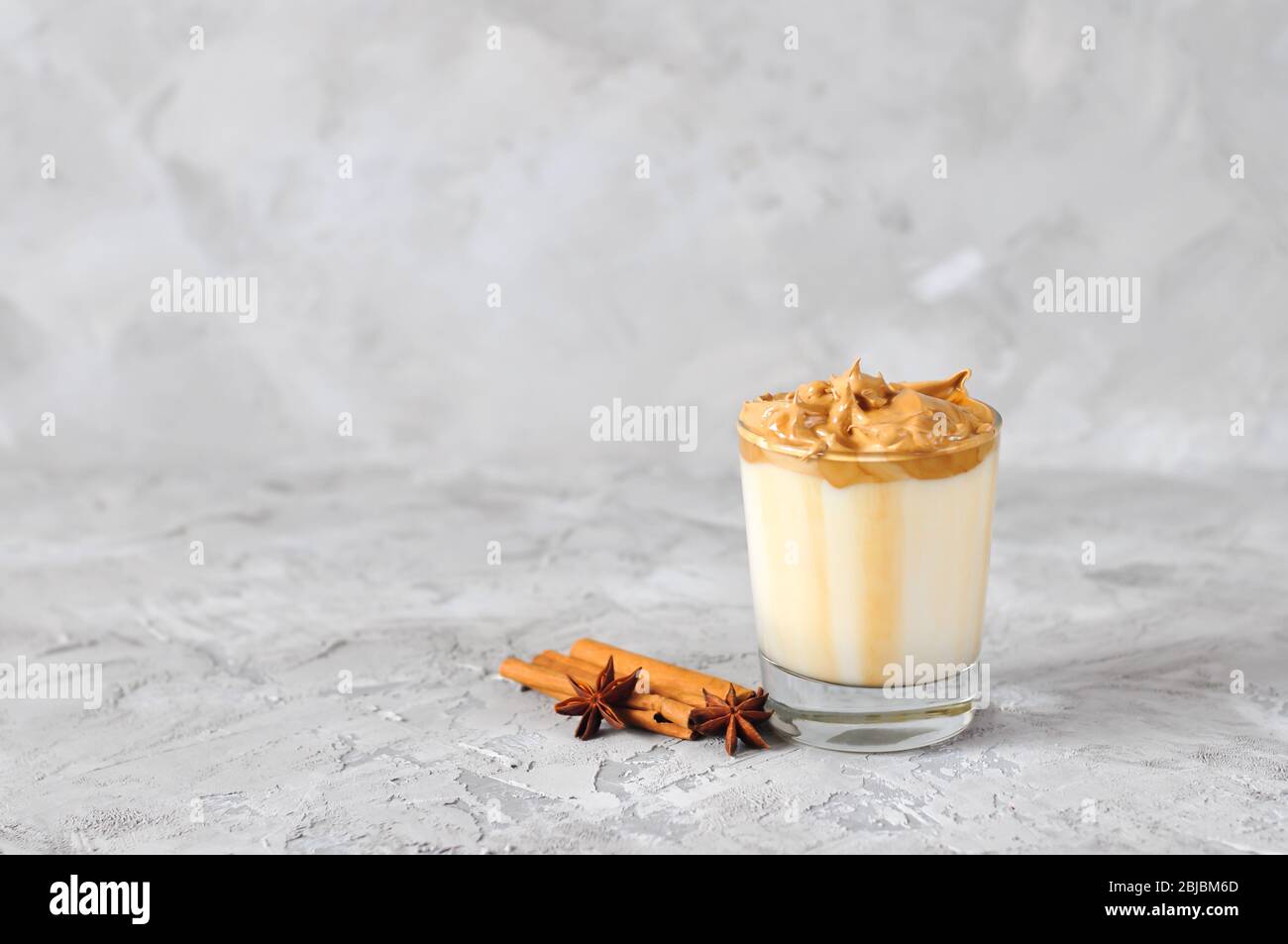 Homemade Dalgona coffee in glass . Recipe popular Korean drink latte with foam of instant coffee. Created new drink during Quarantine and self-isolati Stock Photo