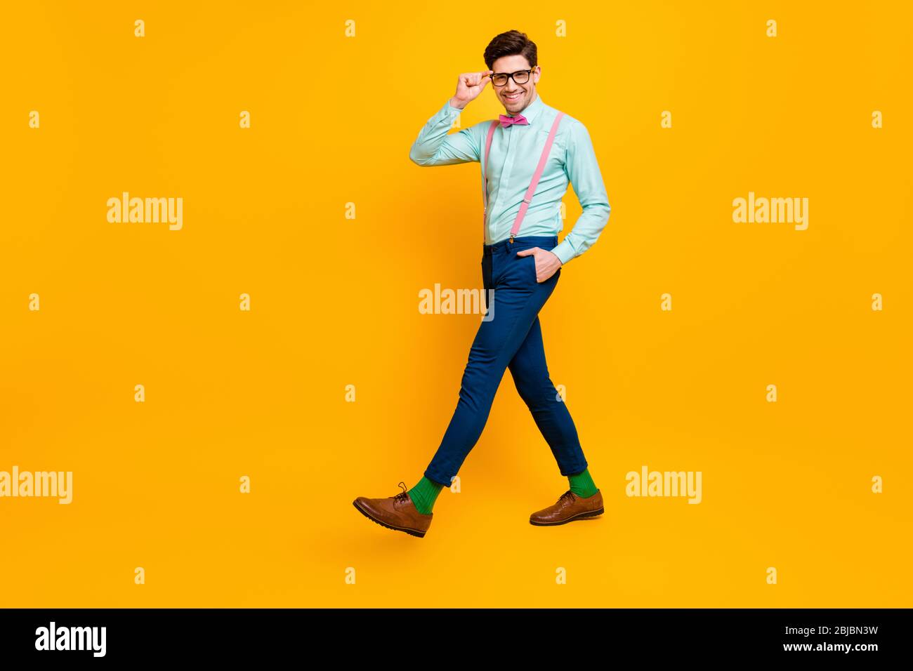 Full Size Profile Photo Of Cool Stylish Guy Boyfriend Walk Down Street Date Girlfriend Wear Specs Shirt Bow Tie Suspenders Trousers Shoes Isolated Stock Photo Alamy
