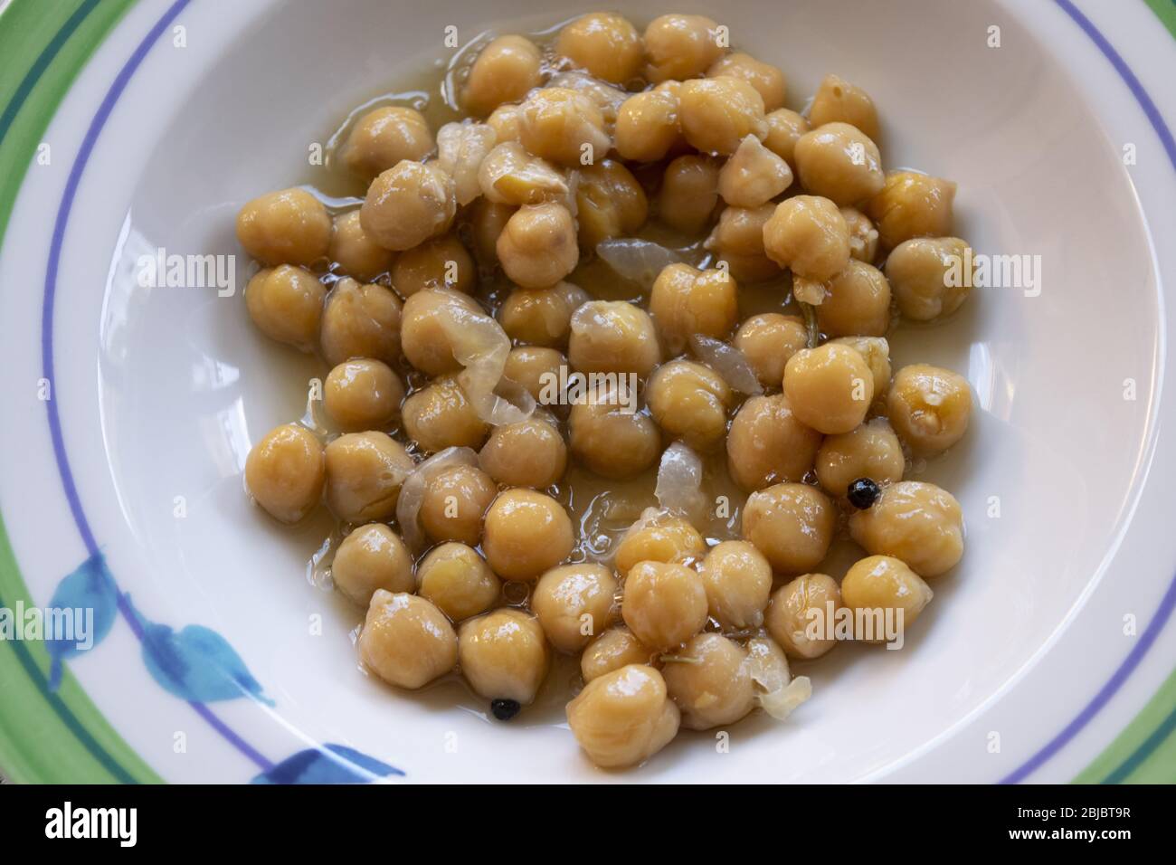 stewed chickpeas soup served in a plate Stock Photo