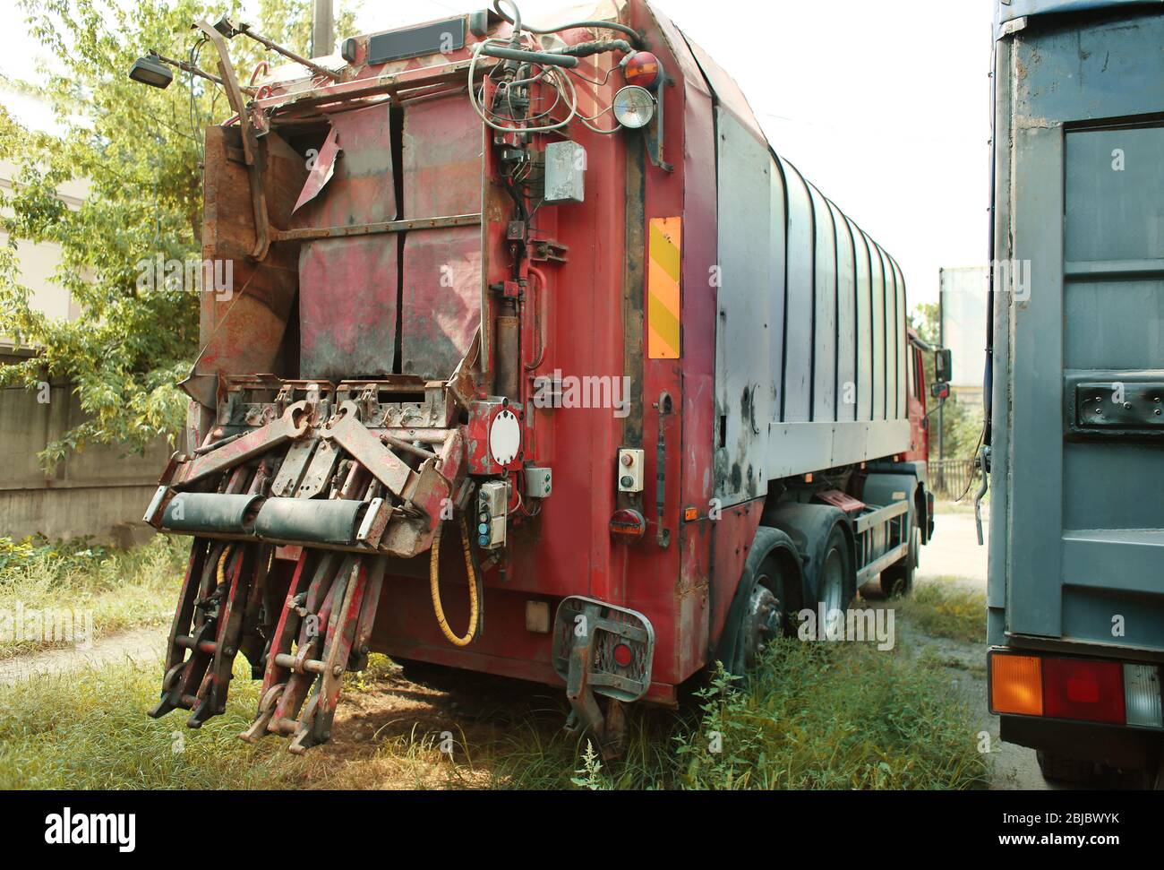 Back of garbage truck Stock Photo - Alamy