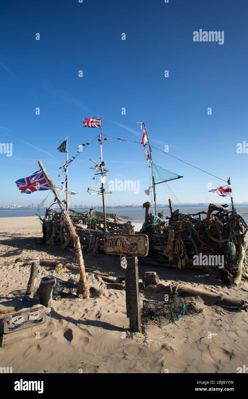 Town of Wallasey, England. Picturesque view of the Black Pearl pirate ship on the shores of New Brighton beach. Stock Photo