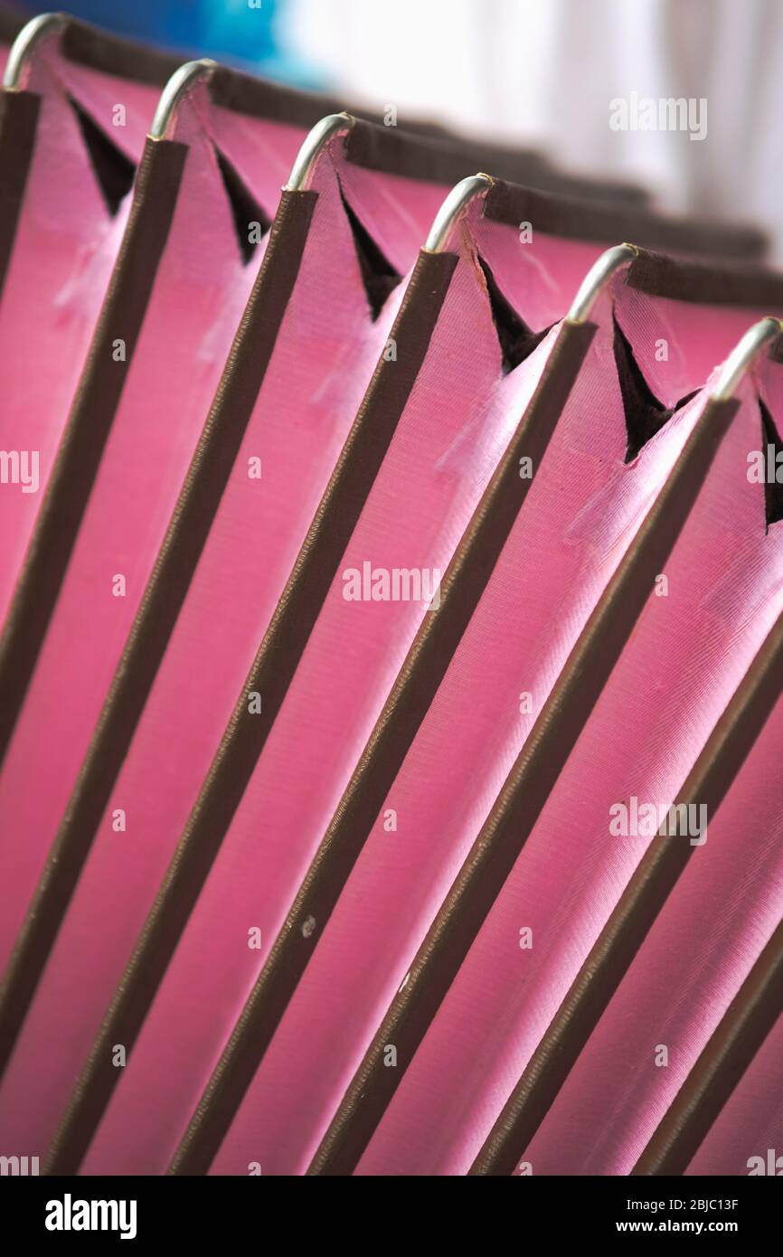Bellows of an old accordion. Details of a vintage musical instrument