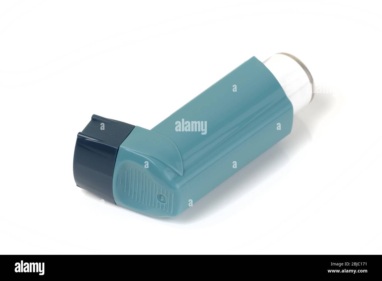 A checkmark shaped Inhaler for asthma isolated on white Stock Photo