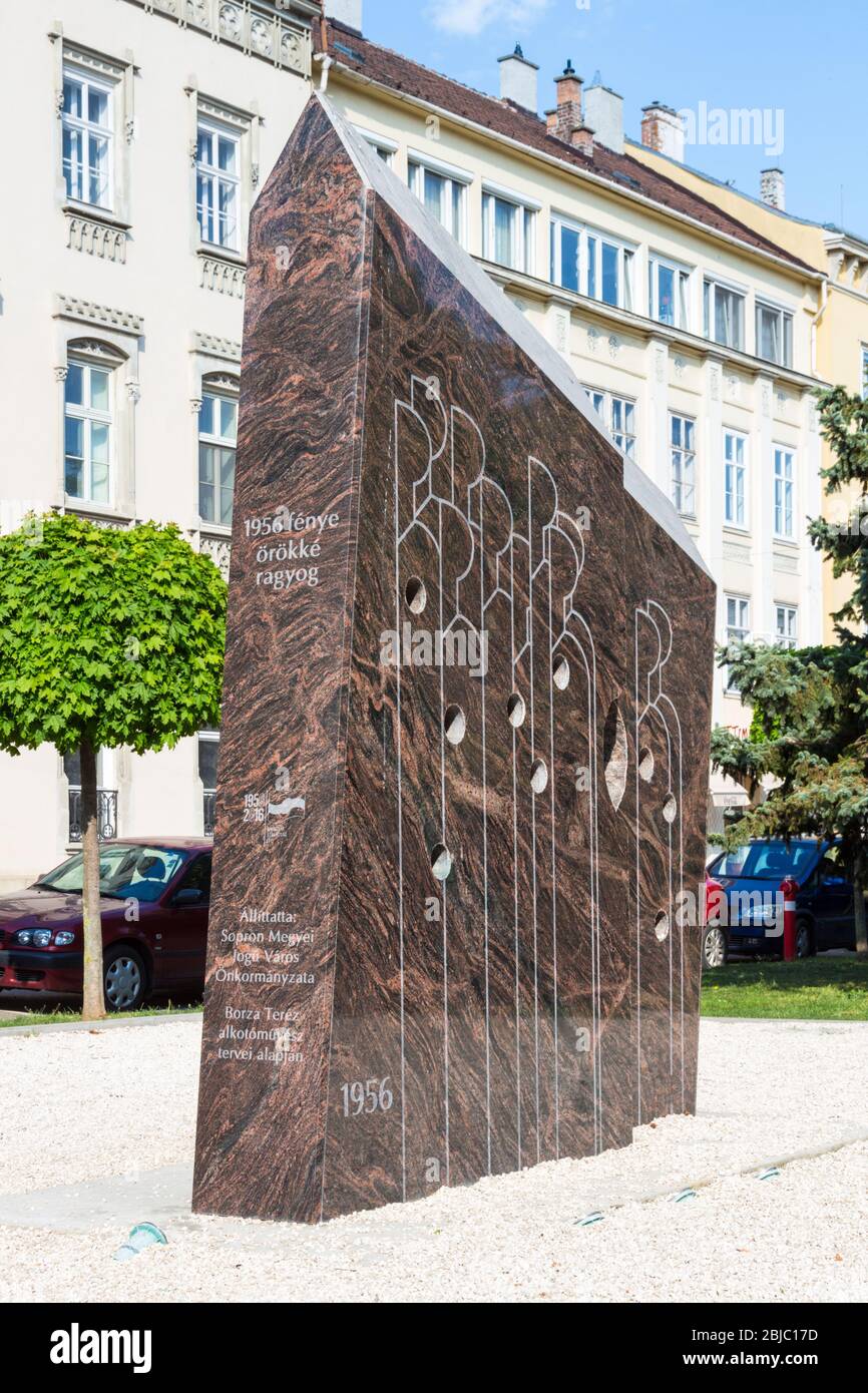 Granite memorial statue of the 1956 Hungarian Revolution or Uprising, erected in 2016 at Szechenyi ter, Sopron, Hungary Stock Photo