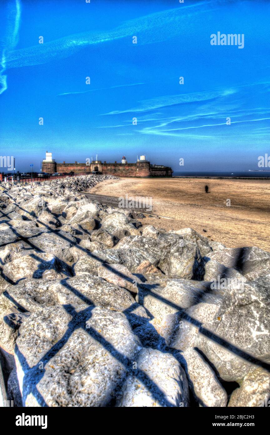 Town of Wallasey, England. Artistic view of New Brighton Beach with Fort Perch Rock in the background. Stock Photo