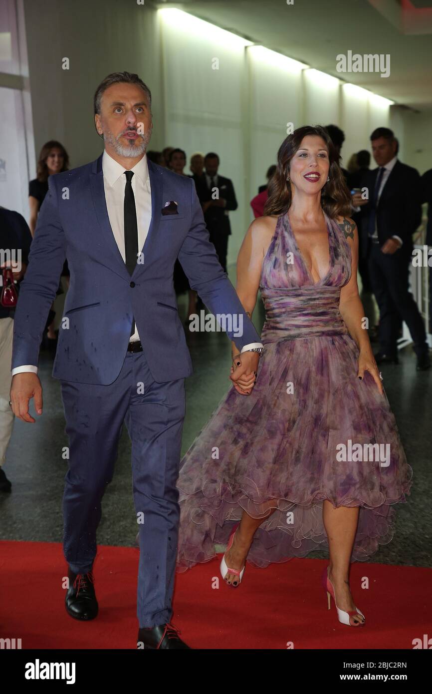VENICE, ITALY - SEPTEMBER 07: Michela Andreozzi and Massimiliano Vado walk the red carpet ahead of the 'Mektoub, My Love: Canto Uno' Stock Photo