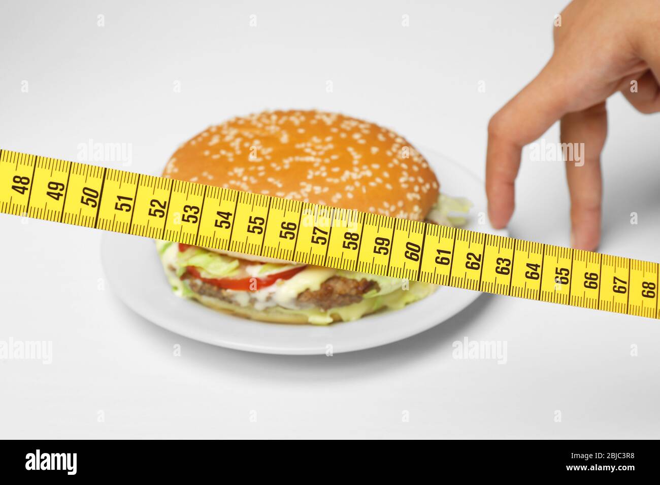 Bun hamburger tape measure hi-res stock photography and images - Alamy