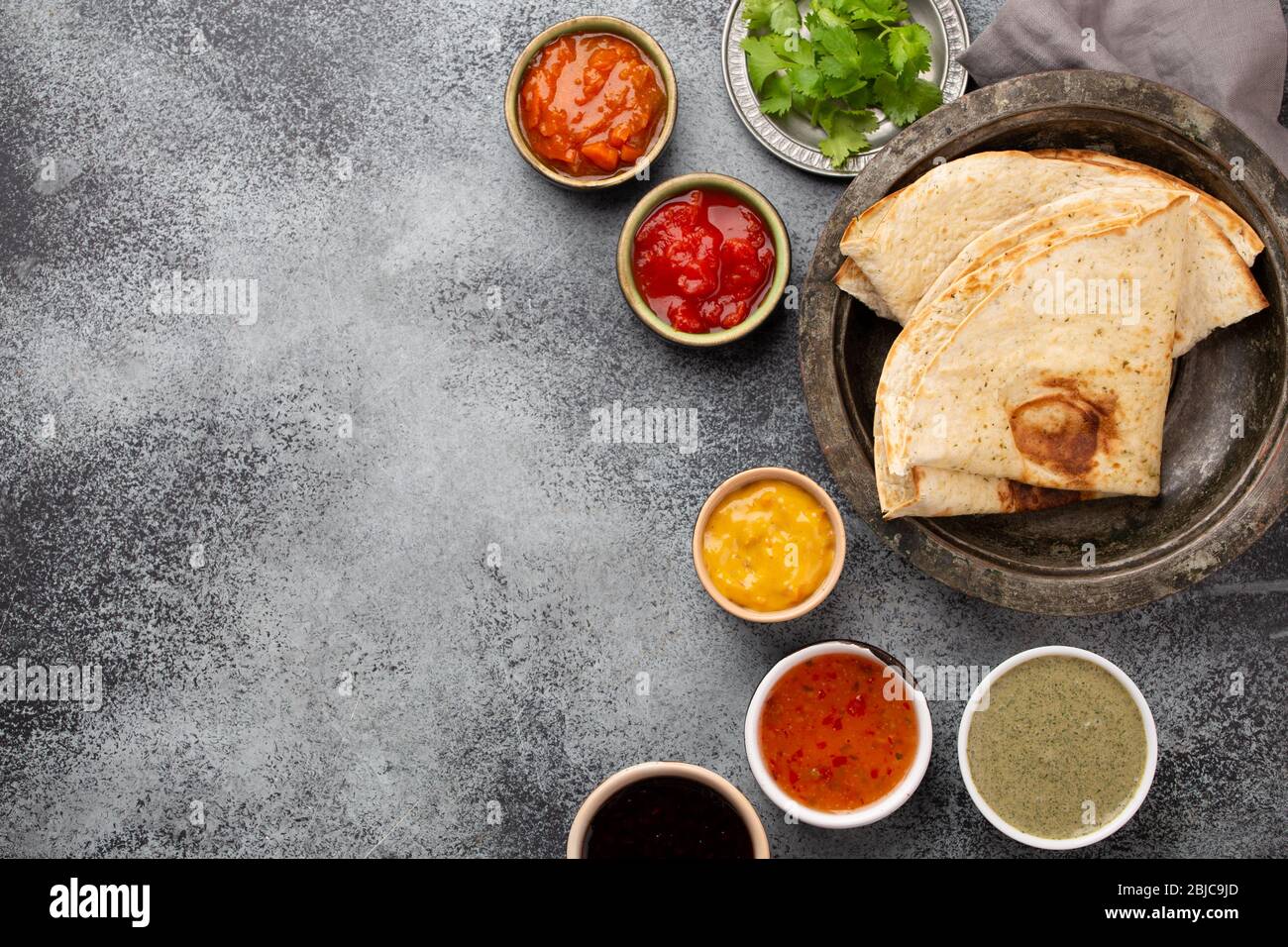 Indian chutneys and flatbread Stock Photo Alamy