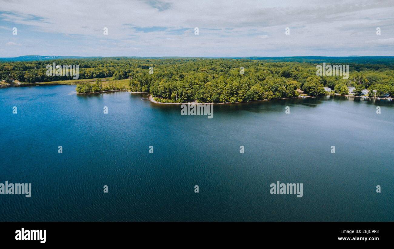 Drone shot looking west over Canobie Lake in New Hampshire Stock Photo