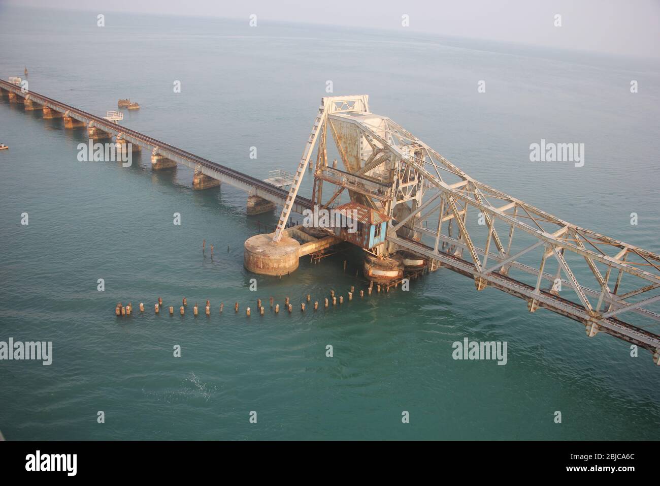 Pamban Bridge is a railway bridge which connects the town of Mandapam in mainland India with Pamban Island in Rameswaram. Stock Photo