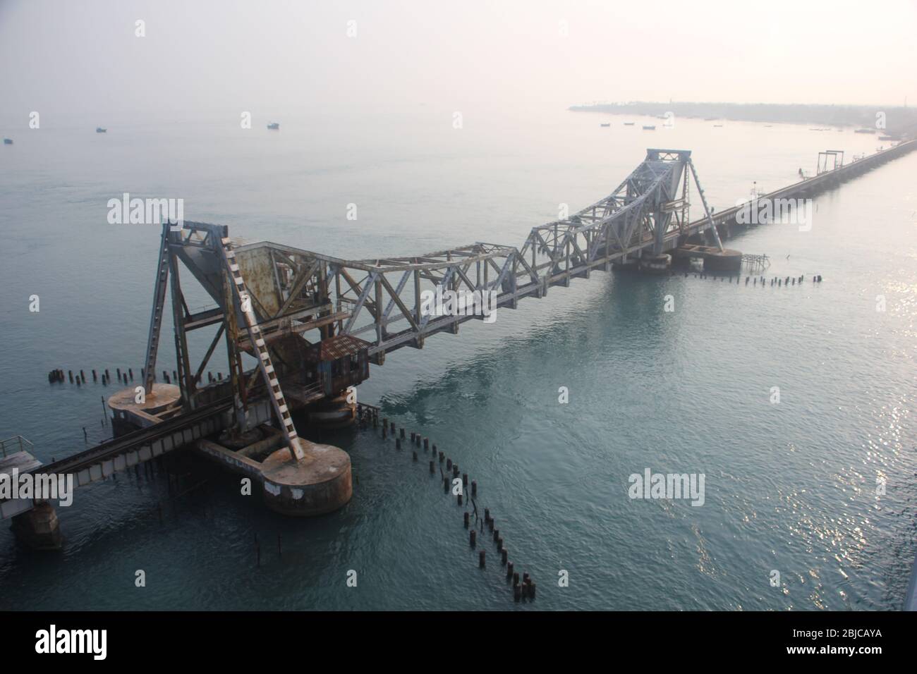 Pamban Bridge is a railway bridge which connects the town of Mandapam in mainland India with Pamban Island in Rameswaram. Stock Photo