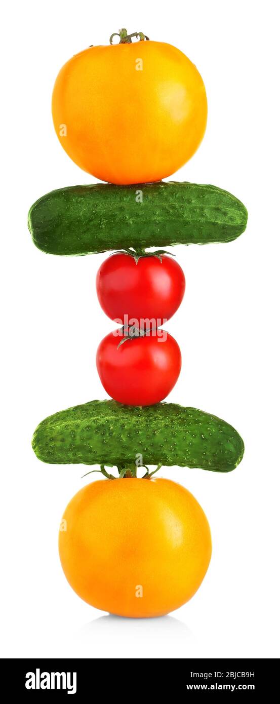 Composition of tomatoes and cucumbers isolated on white Stock Photo Alamy