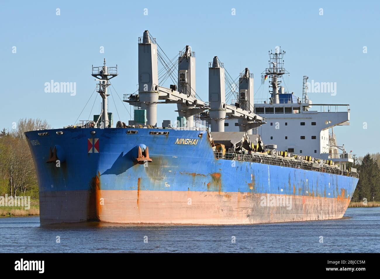 Bulk Carrier Ninghai passing the Kiel Canal bound for Oskarshamn in Sweden Stock Photo