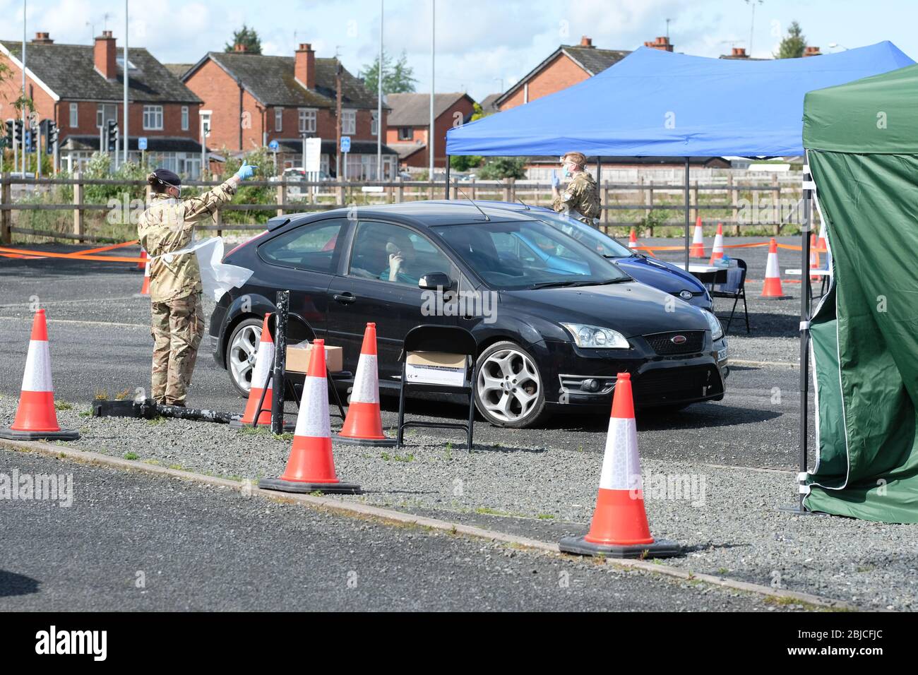 Hereford, Herefordshire UK - Wednesday 29th April 2020 - Army personnel man a pop-up Coronavirus testing site in a car park in Hereford to provide Covid-19 swab tests to frontline workers as the Government strives to reach 100,000 tests per day by the end of April.  Photo Steven May / Alamy Live News Stock Photo