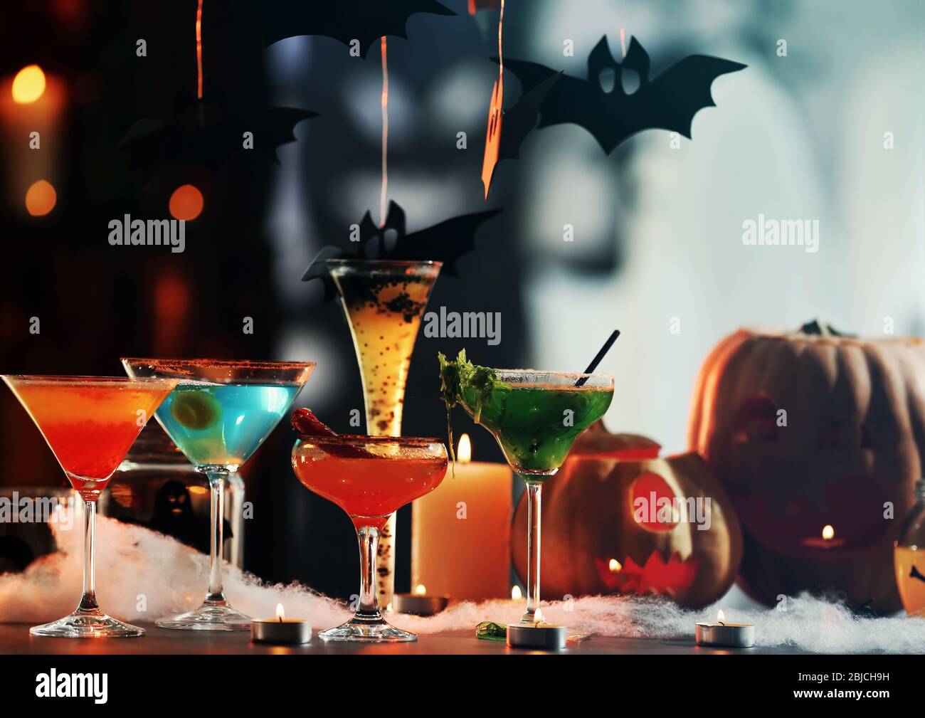 Colorful cocktails and decor for Halloween party, on blurred background  Stock Photo - Alamy