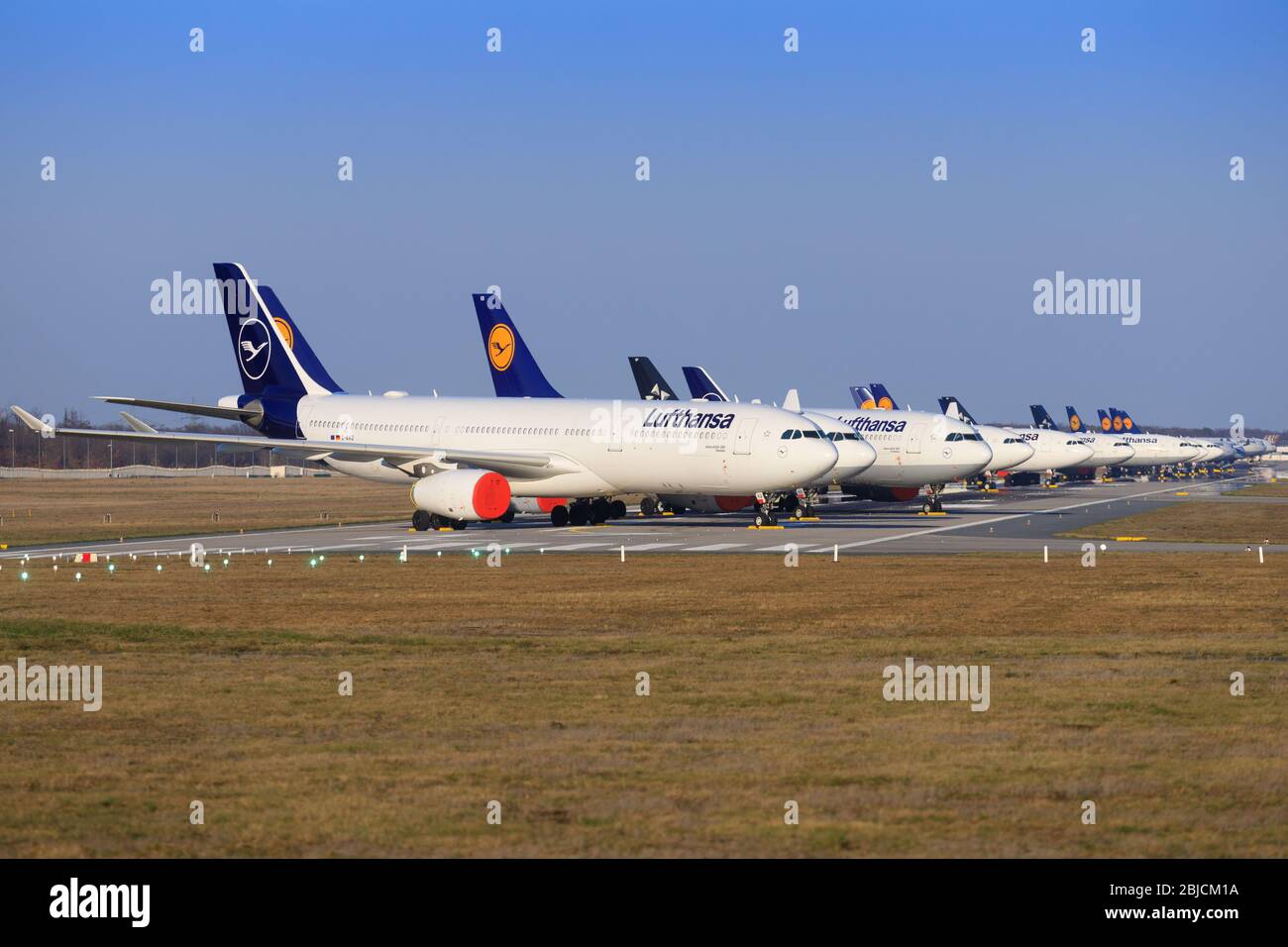 Frankfurt, Germany – April 7, 2020: Lufthansa airplanes during Coronavirus Corona Virus COVID-19 at Frankfurt  Airport in Germany Stock Photo