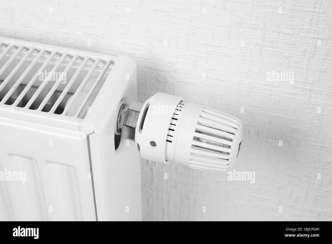 Temperature knob of heating radiator Stock Photo