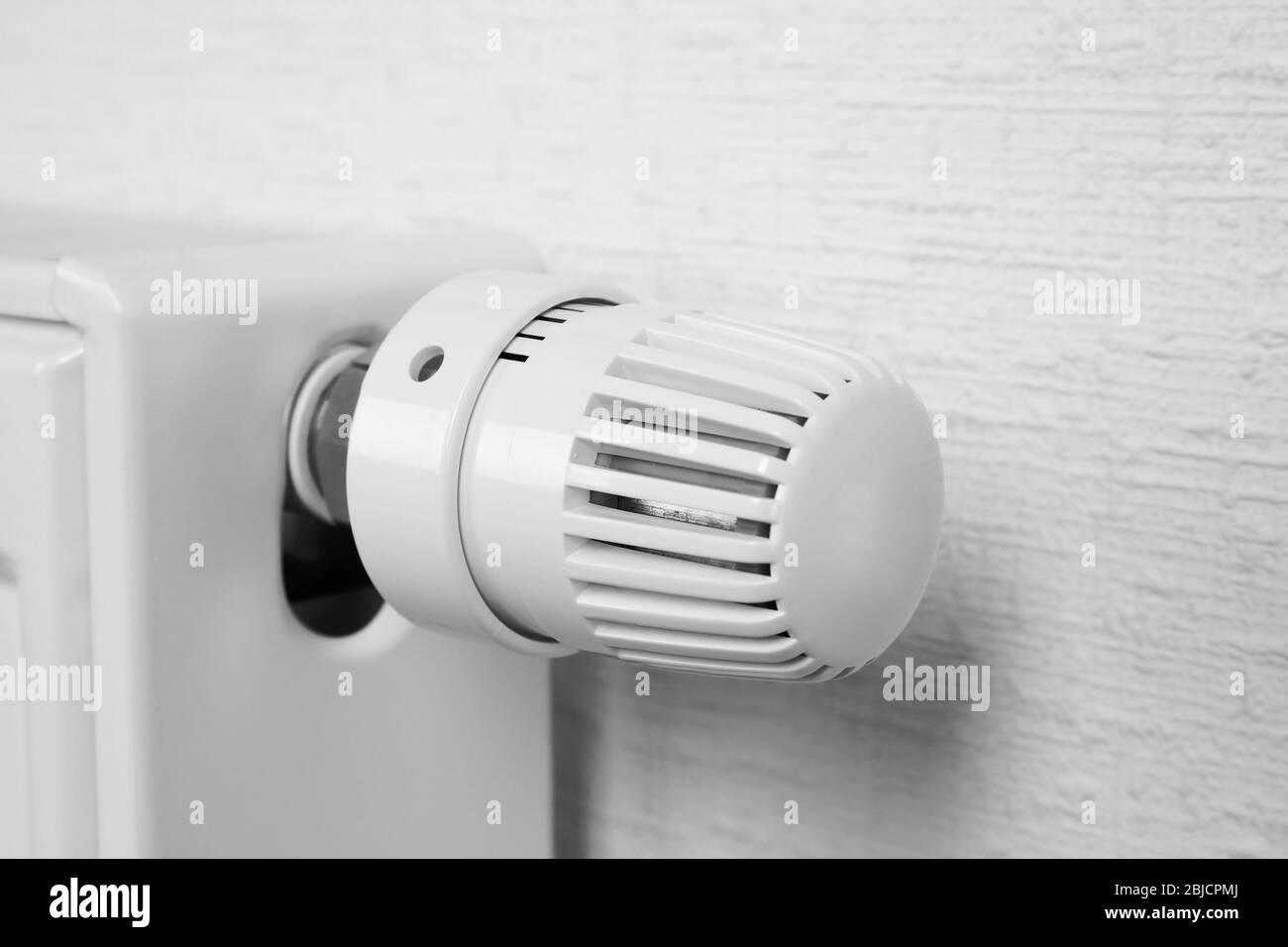 Temperature knob of heating radiator Stock Photo