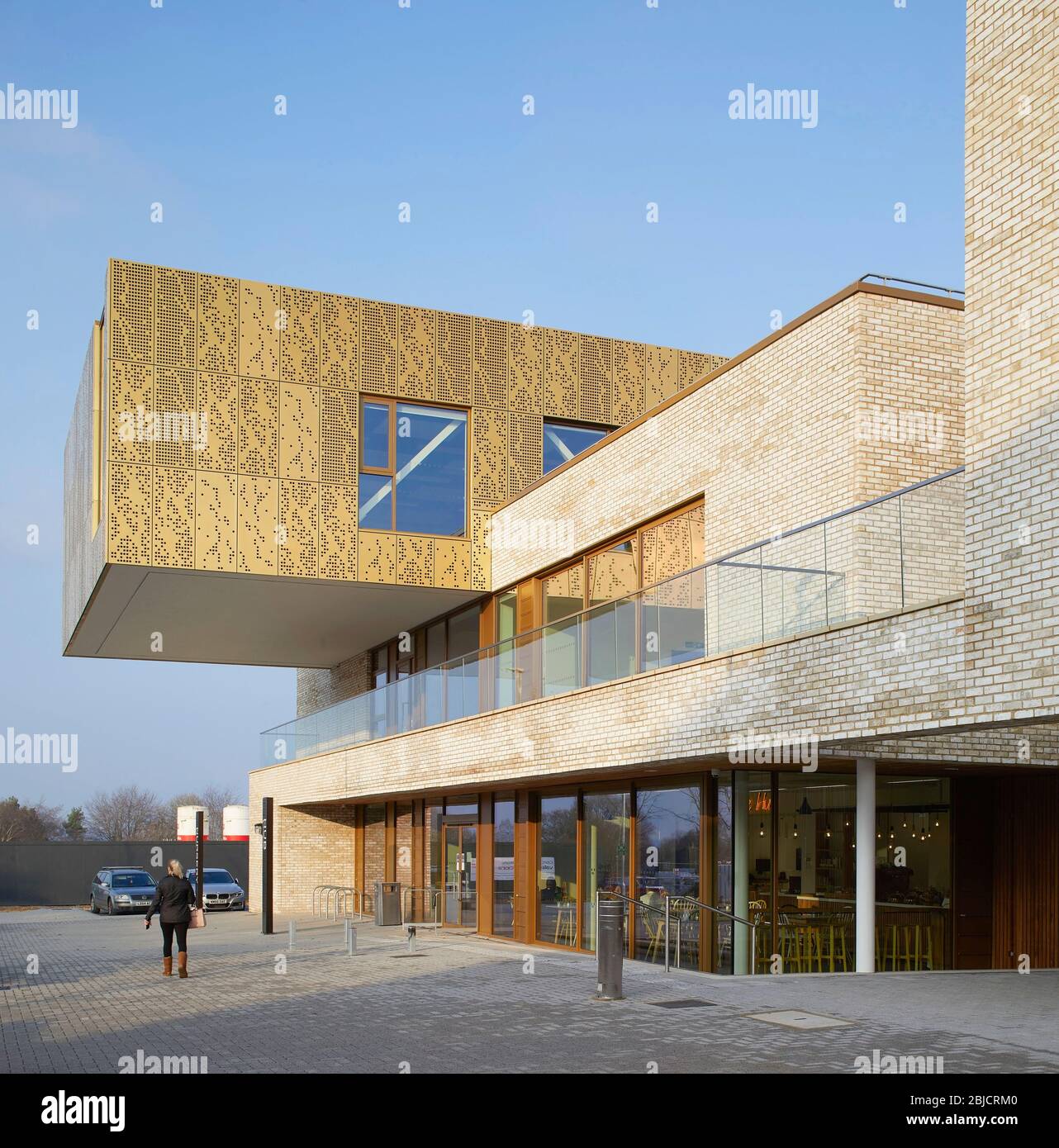 Oblique view with ground floor cafe and landscaped public space
