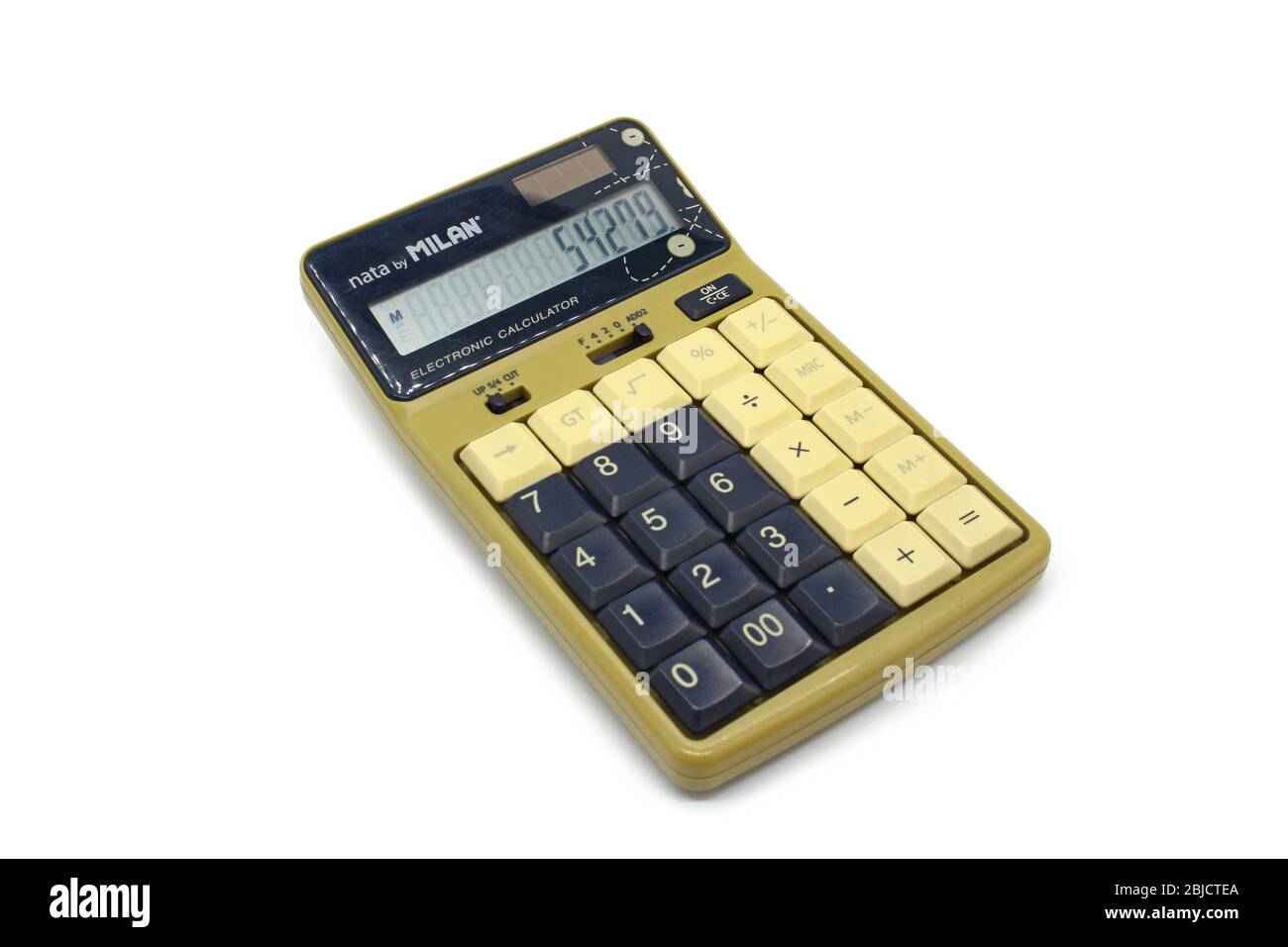 Vintage electronic calculator close up isolated on white background Stock Photo