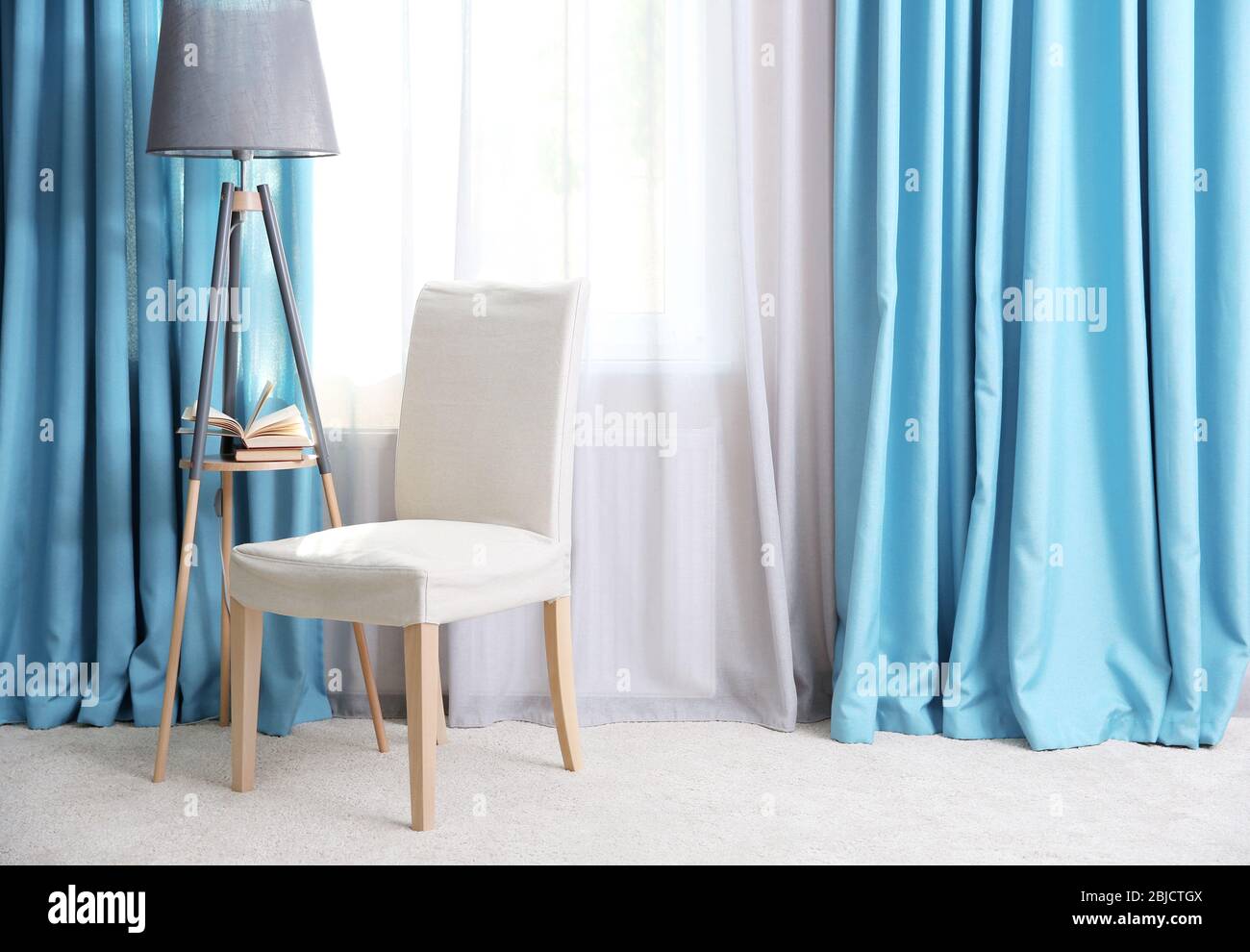 Living room with modern curtains Stock Photo - Alamy