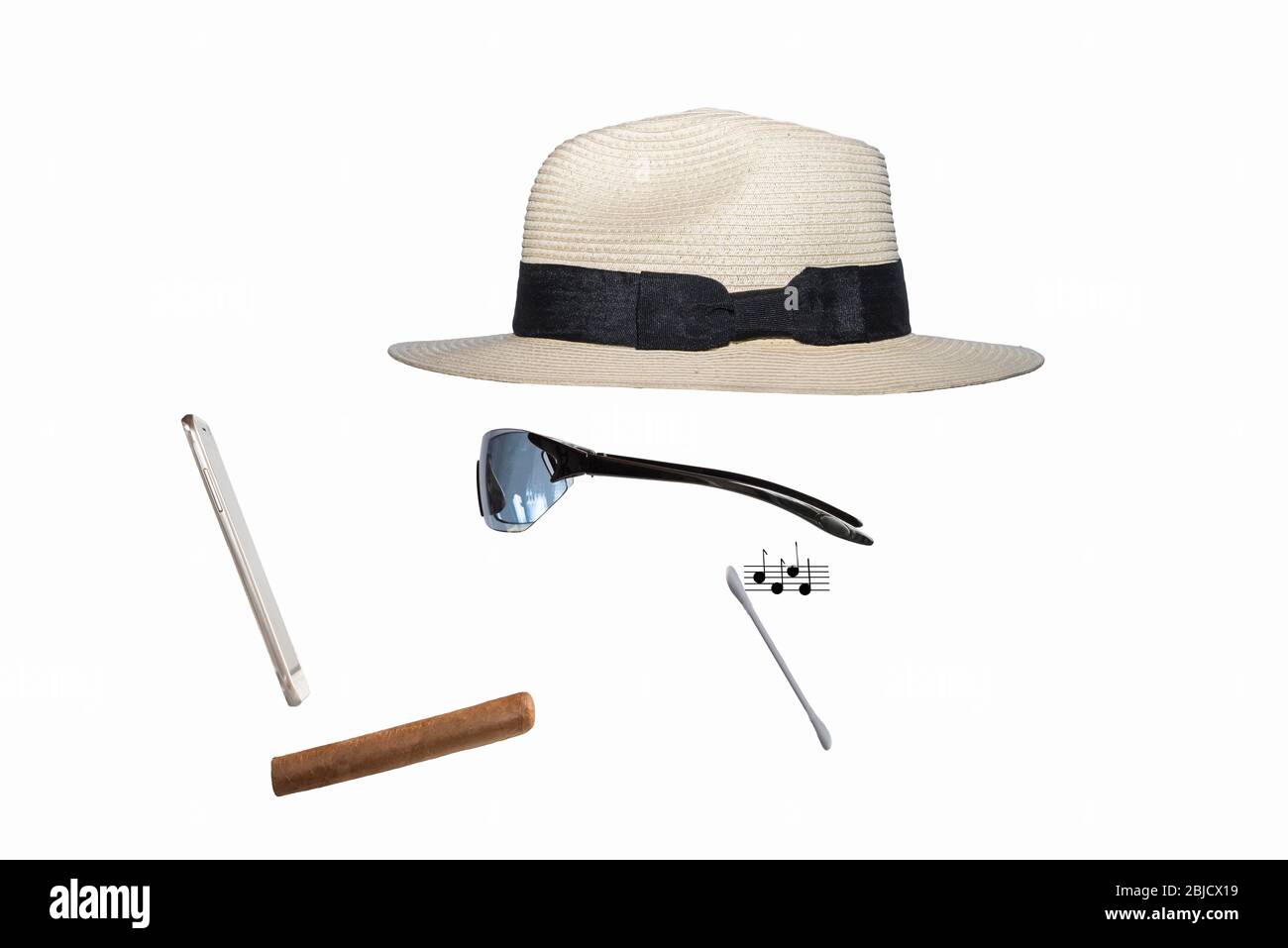 Panama hat, sun glasses, mobile phone, cigar & earbud + typed musical notes. Concept: invisible man, Modern man, fashion, streaming, modern earphones. Stock Photo