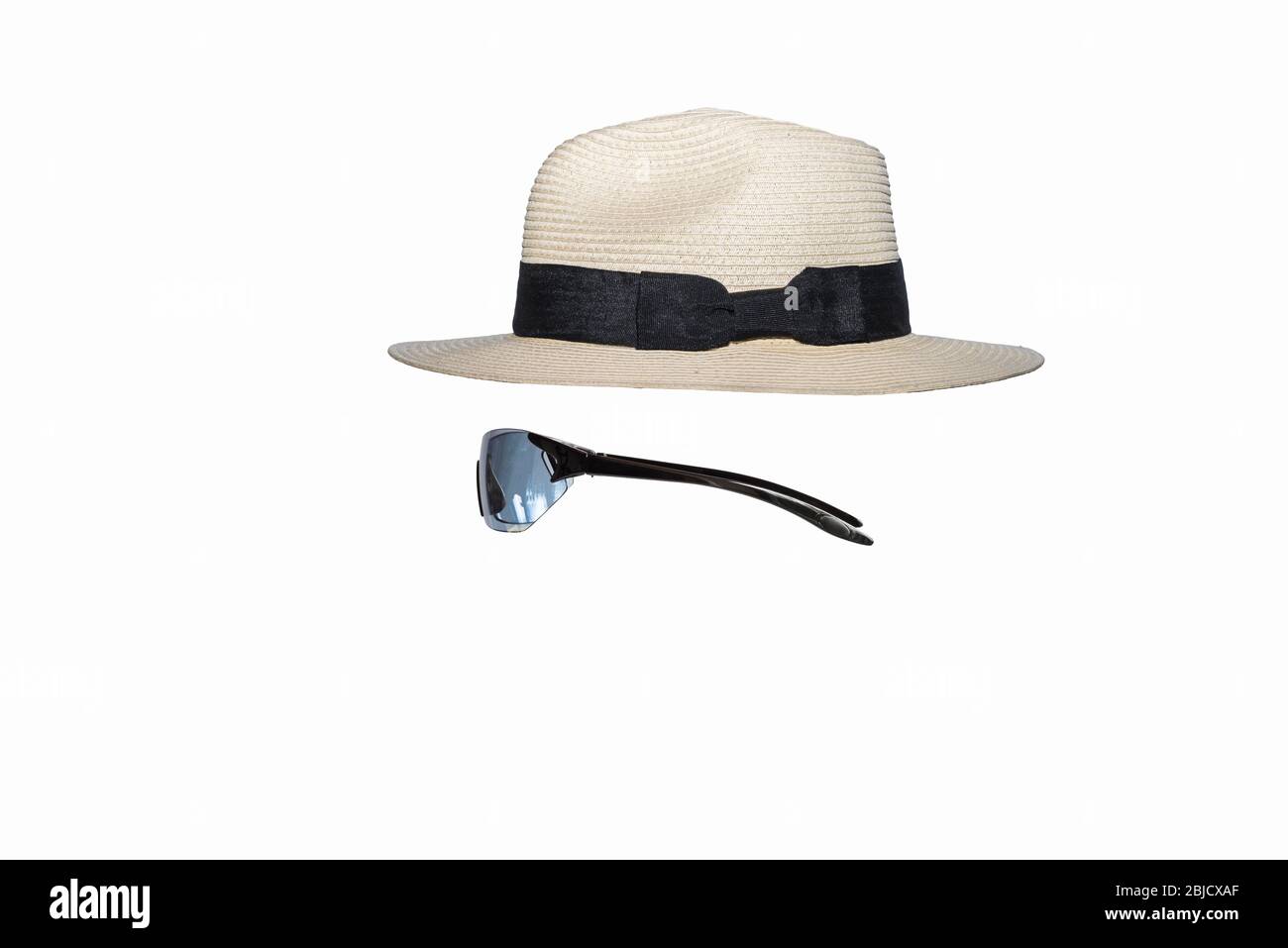 Panama hat, sun glasses, Concept: invisible man, Modern man, fashion,  streaming, earphones, man of the world, Sophistication, suave, swanky, Stock Photo