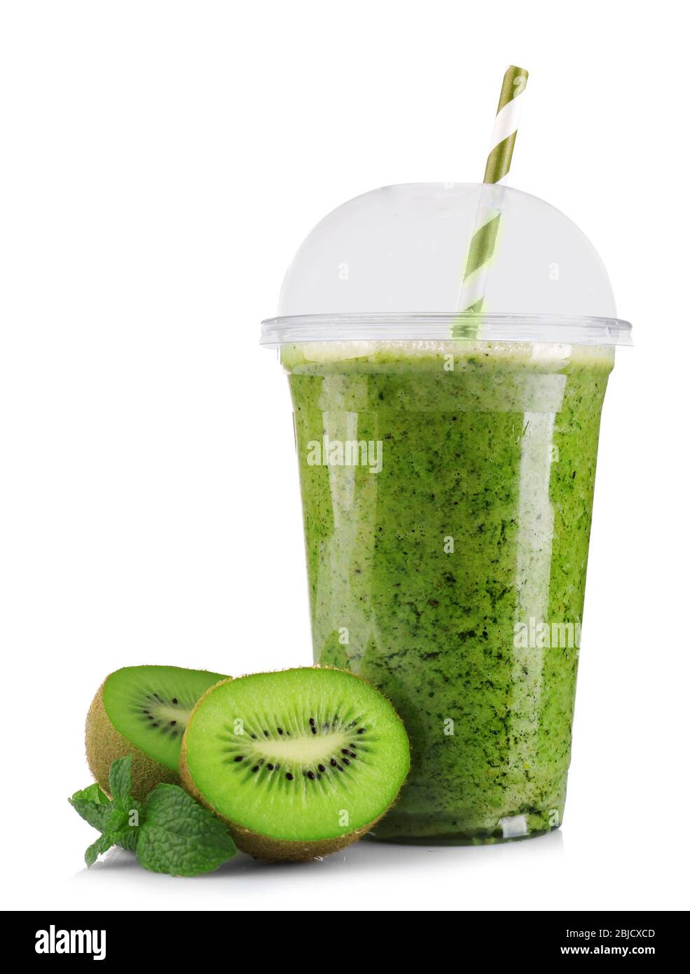 Delicious kiwi milkshake in plastic cup isolated on white Stock Photo